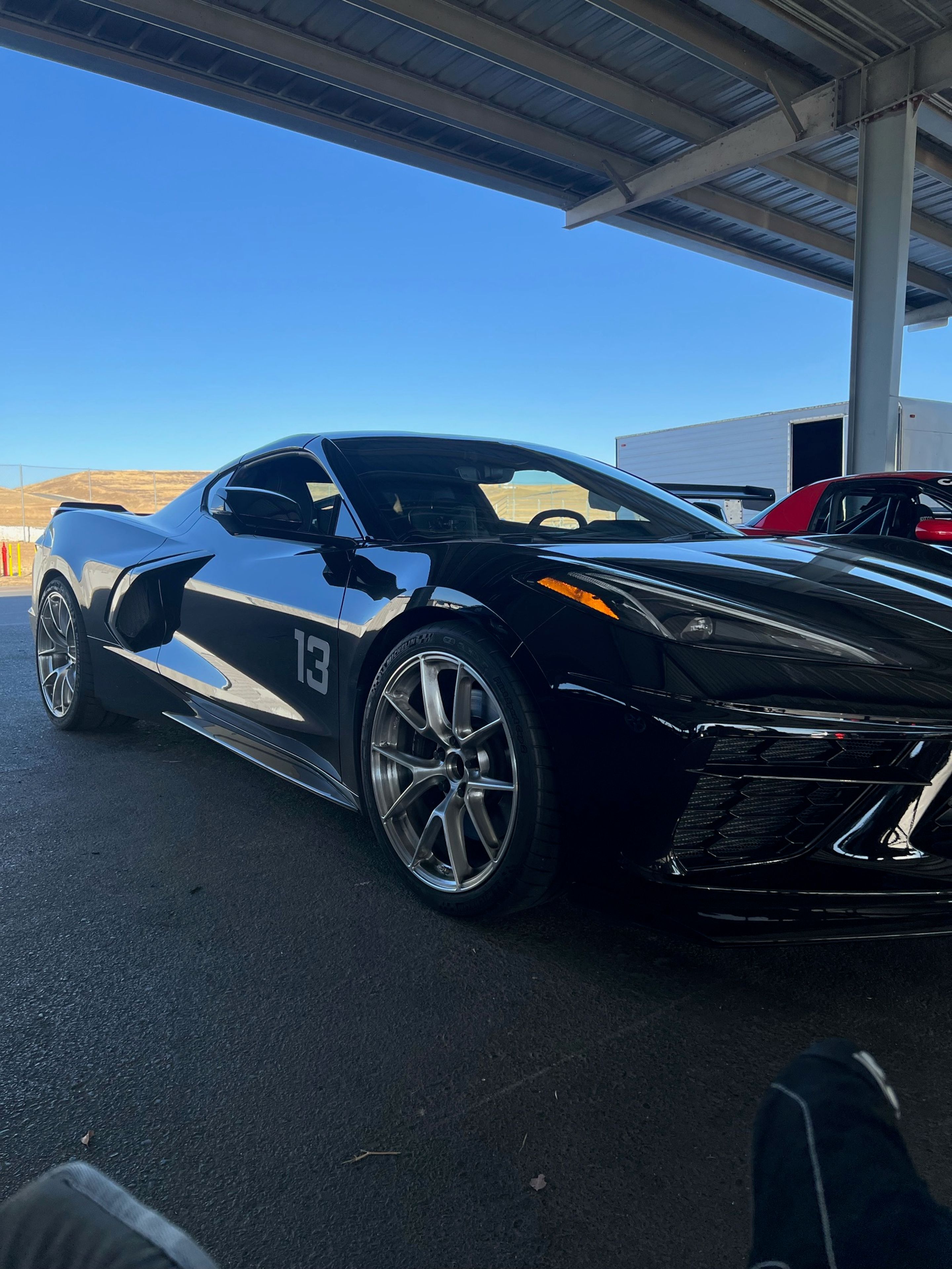 Black Chevrolet C8 Corvette Stingray/Z51 with 19"/20" VS-5RS Apex wheels in Brushed Clear