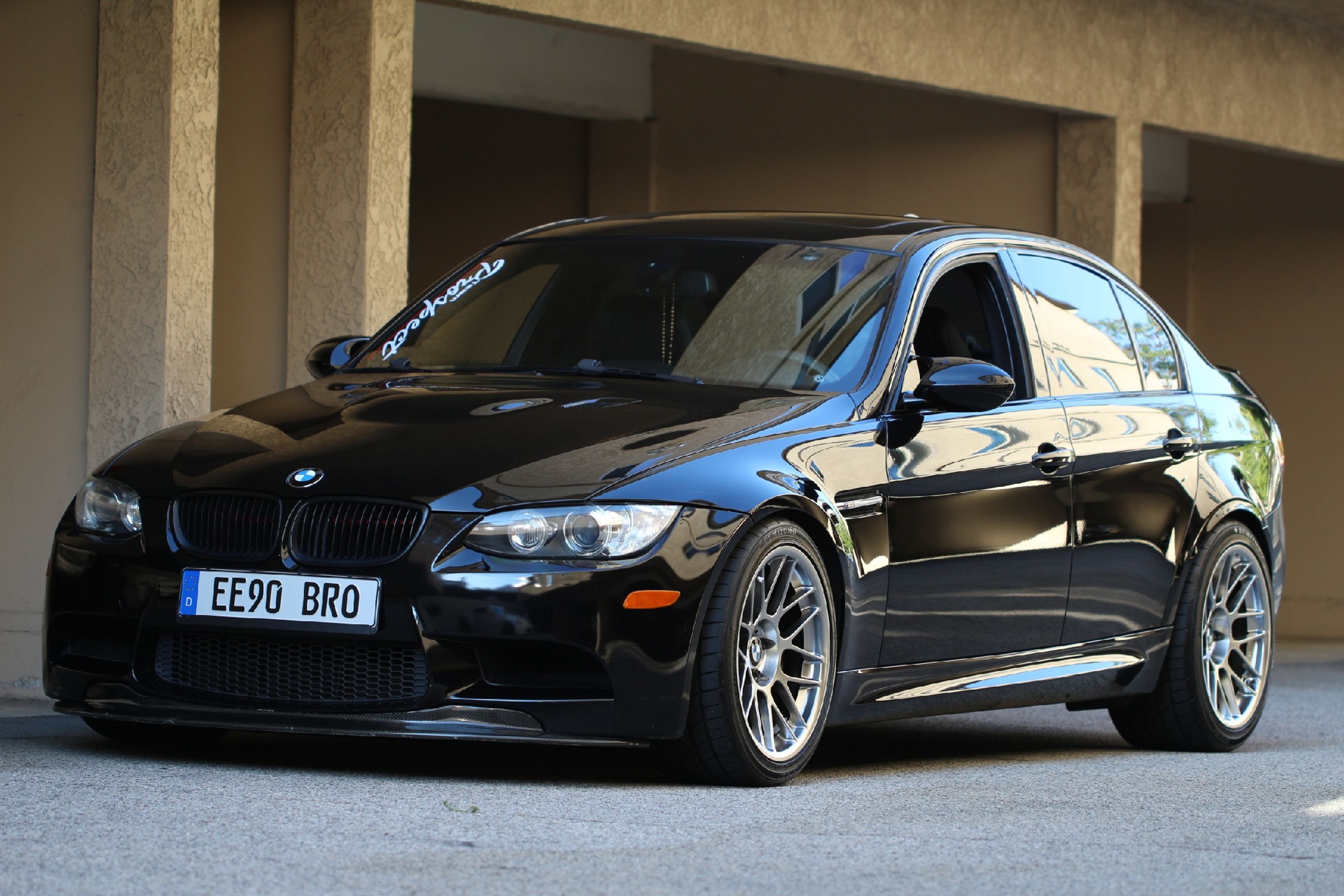 Black BMW E90 Sedan M3 with 18" ARC-8 Apex wheels in Hyper Black