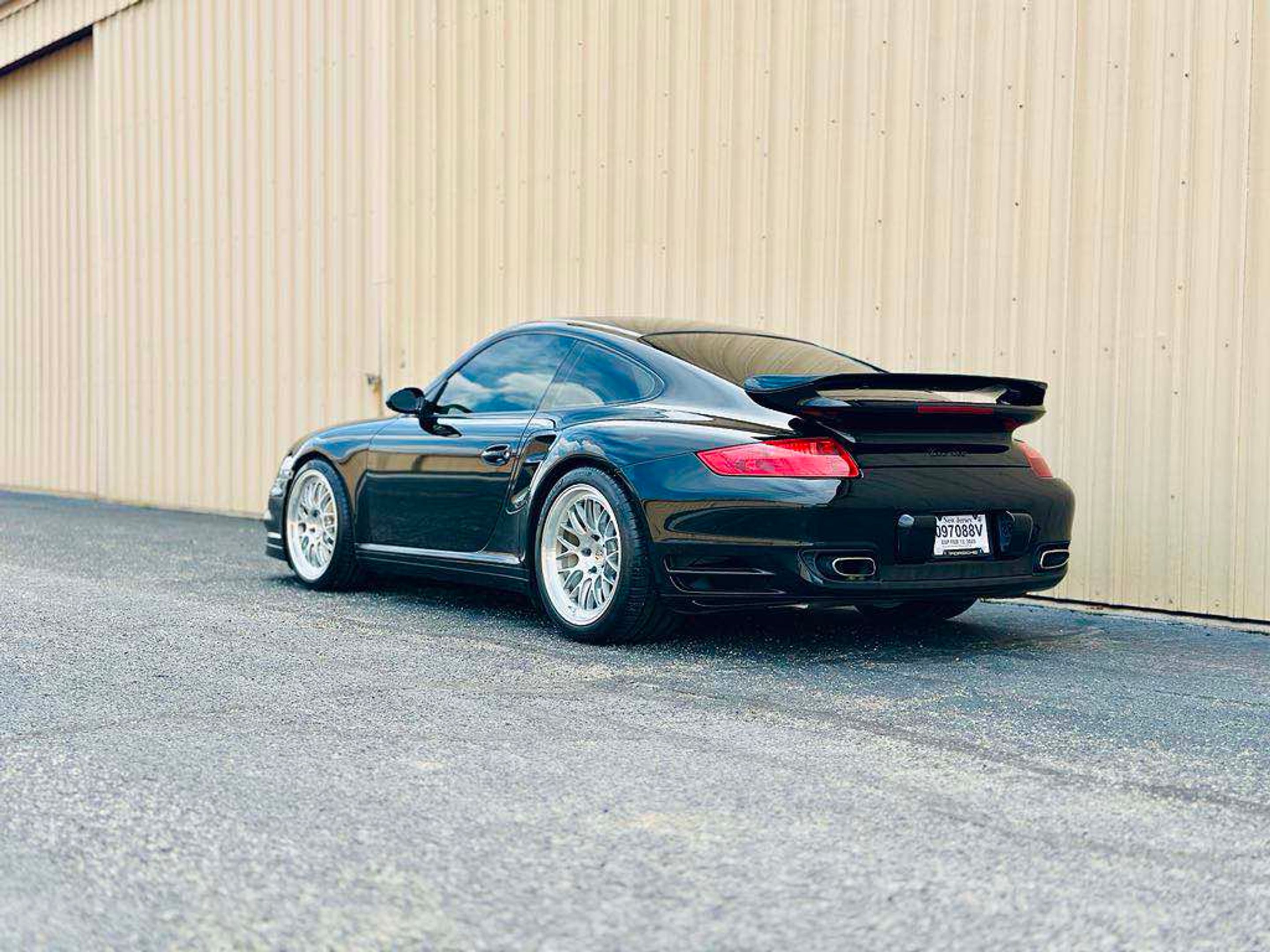Black Porsche 911 997 Turbo with 19" ML-10RT Apex wheels in Machined Lip Brushed Clear