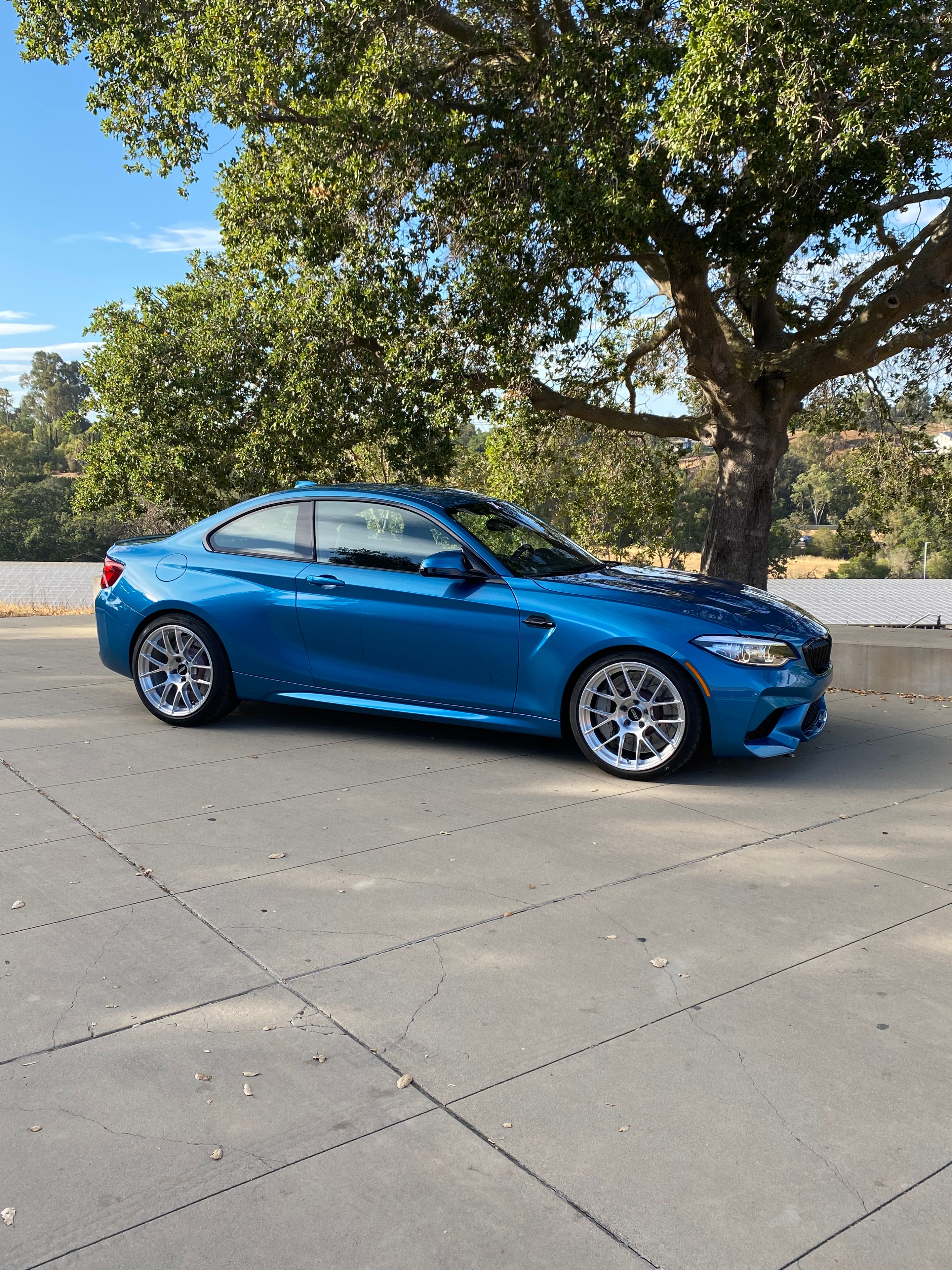 Blue BMW F87 M2 with 19" EC-7RS Apex wheels in Brushed Clear