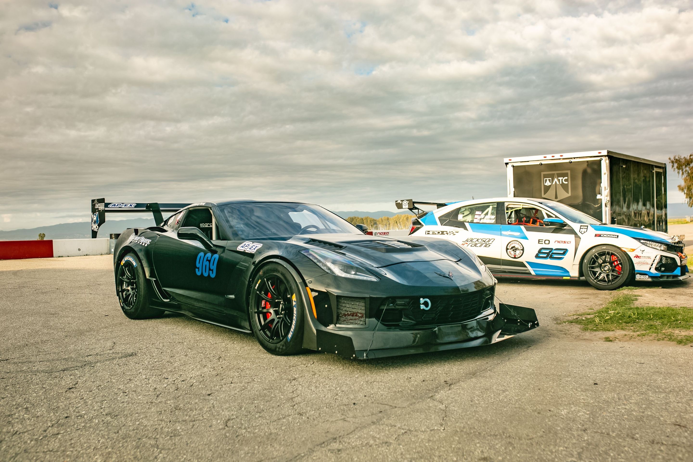 Black Chevrolet C7 Corvette Z06 with 18" SM-10 Apex wheels in Satin Black