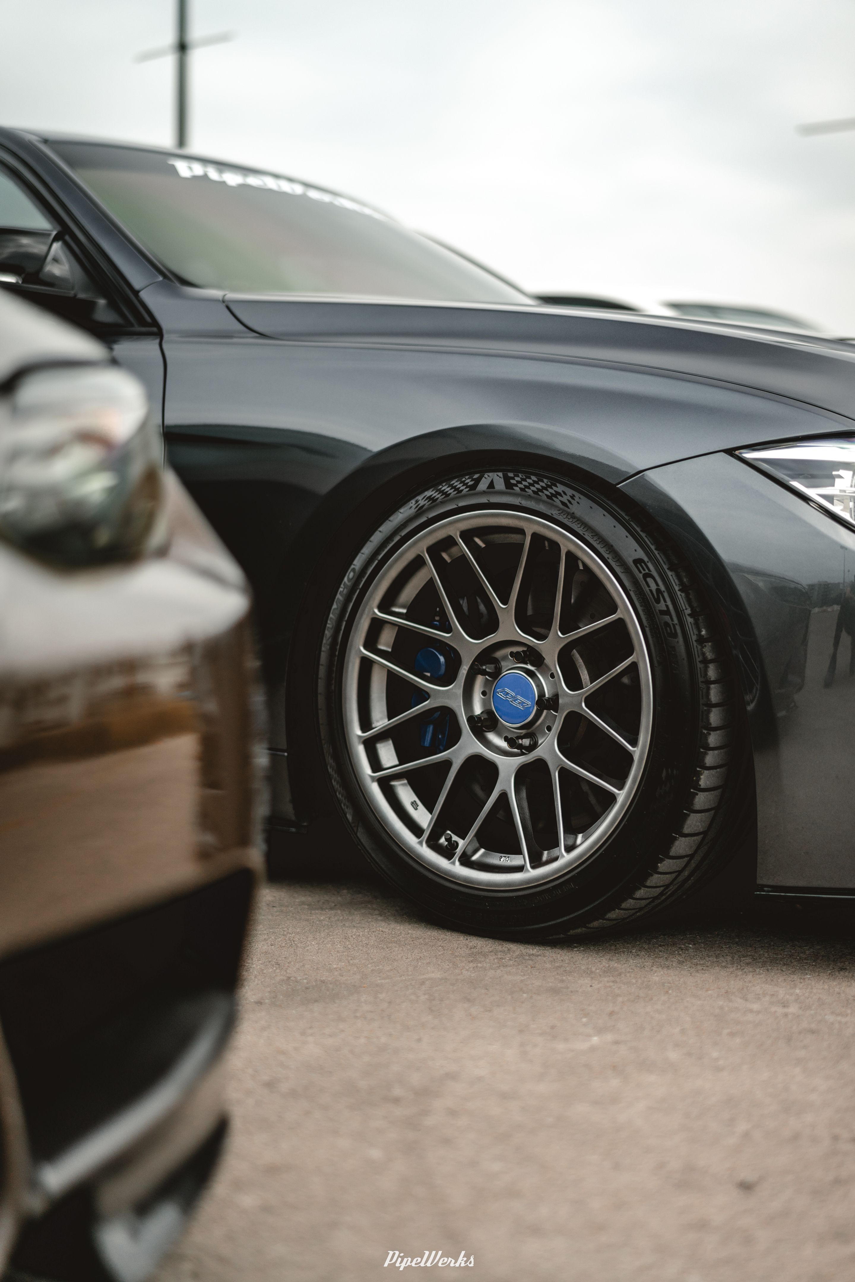 Grey BMW F30 Sedan 3 Series with 18" ARC-8 Apex wheels in Hyper Black