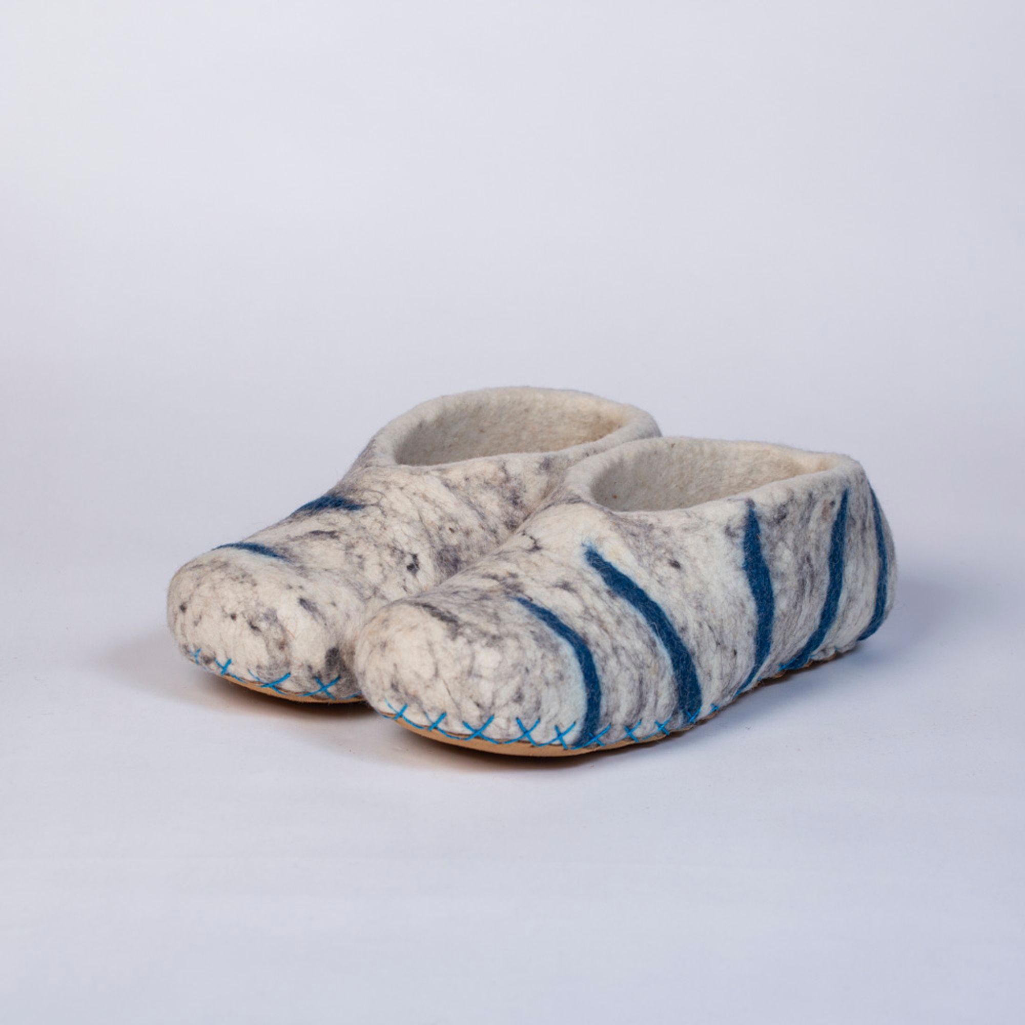 Hand-felted Wool Valley Slippers made in Peru. Model: Snow Leopard