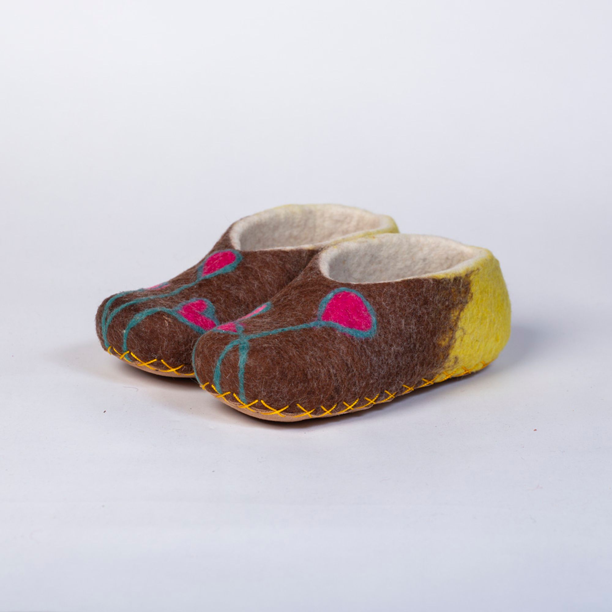Hand-felted Wool Valley Slippers made in Peru. Model: Hearts Away