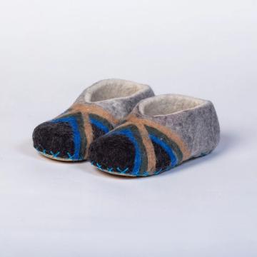 See All Simple Slippers. Hand-felted Wool Valley Slippers made in Peru. Model: Etiquette