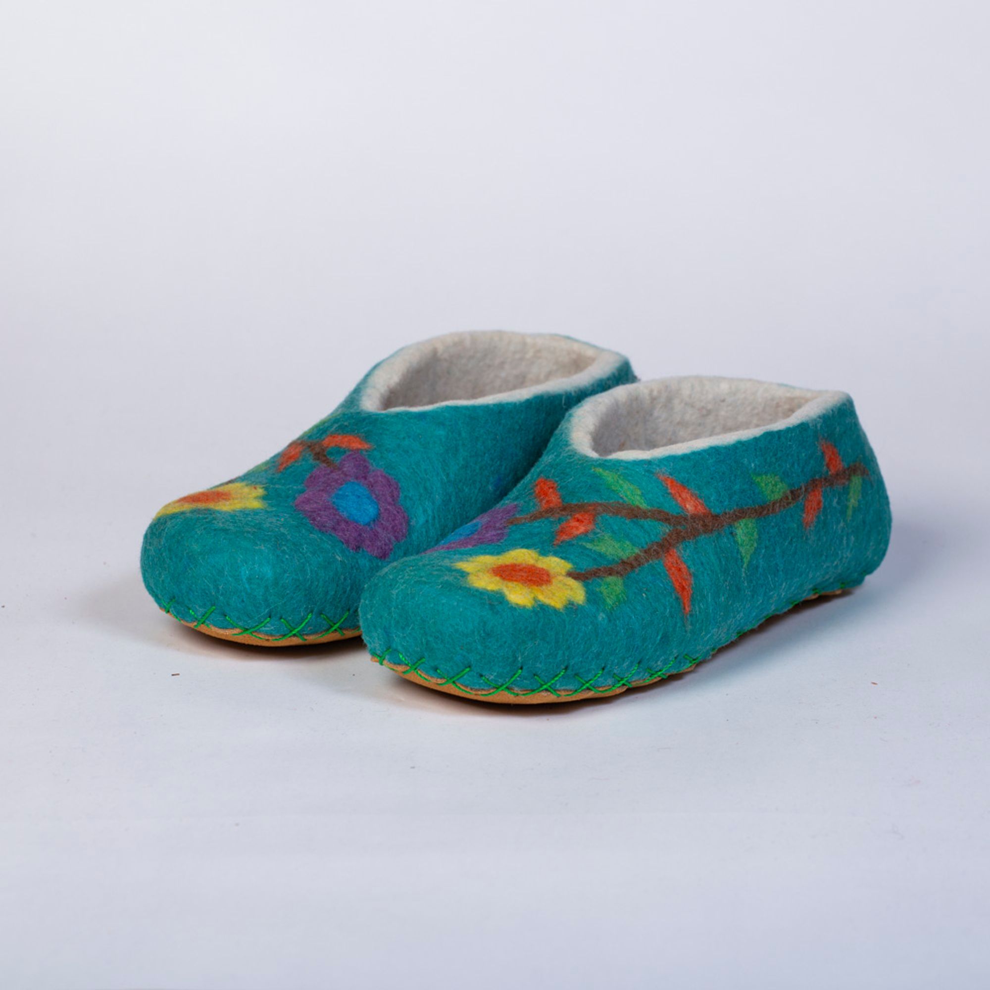Hand-felted Wool Valley Slippers made in Peru. Model: Peace