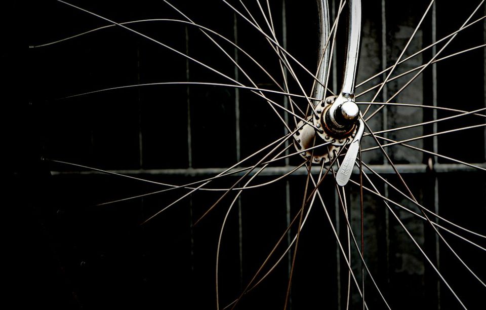 a close up of a bicycle spokes and spokes