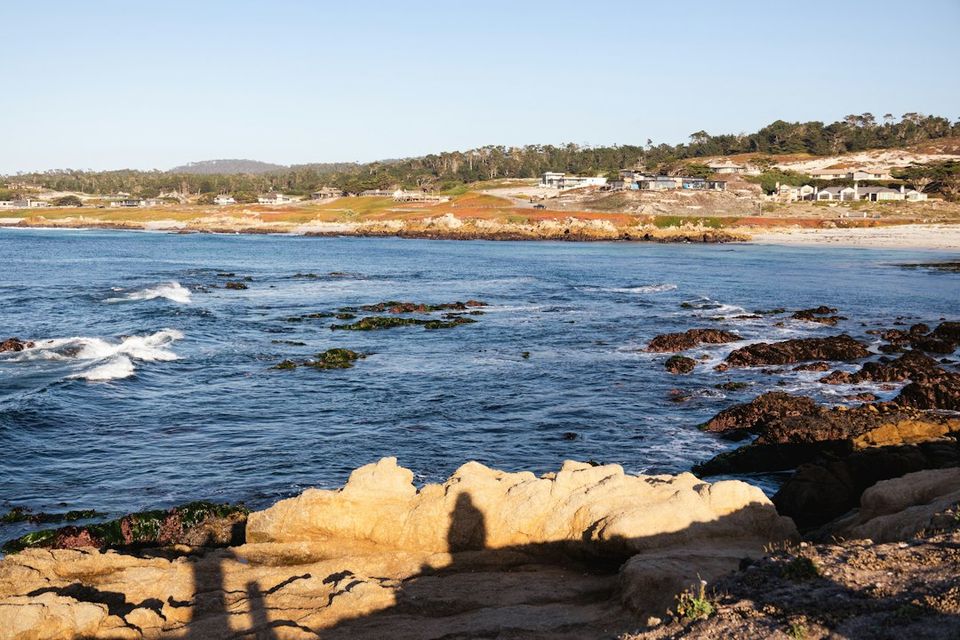 Rocky coastline with waves crashing near shore