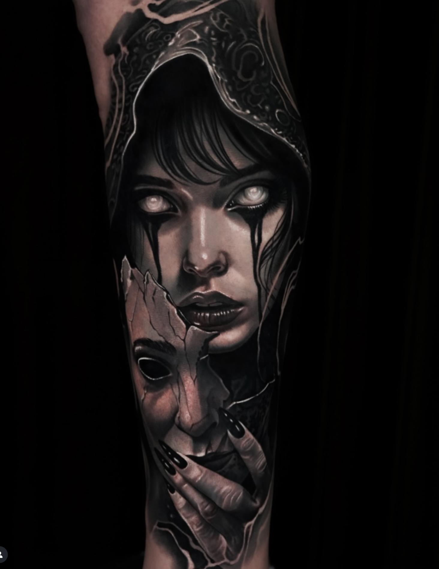 Black and grey realistic horror mask tattoo on forearm