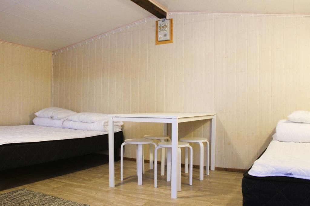 Cottage 19 at Ivalo River Camping, accommodation for three guests