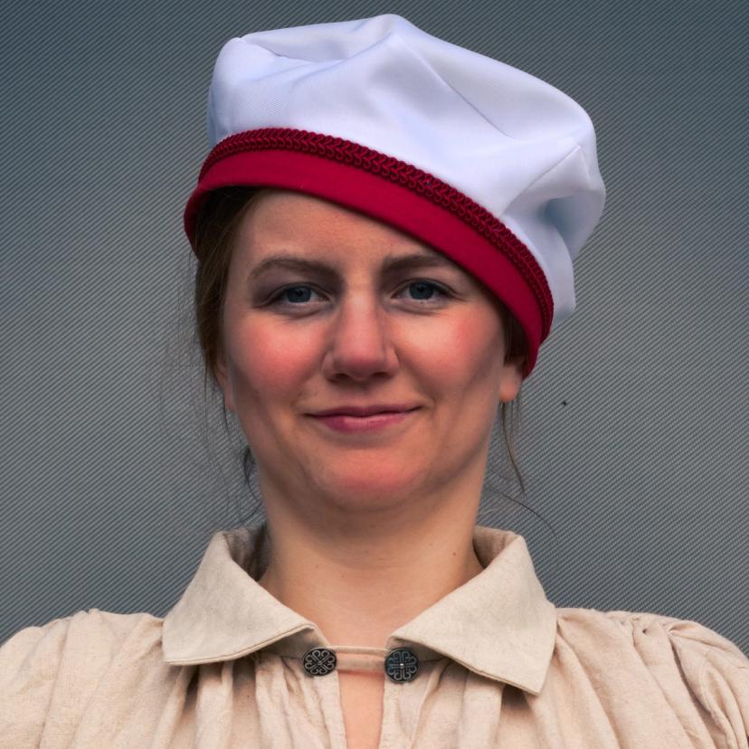 Portrettbilde av en fattigslig sjømann i for stor lue.