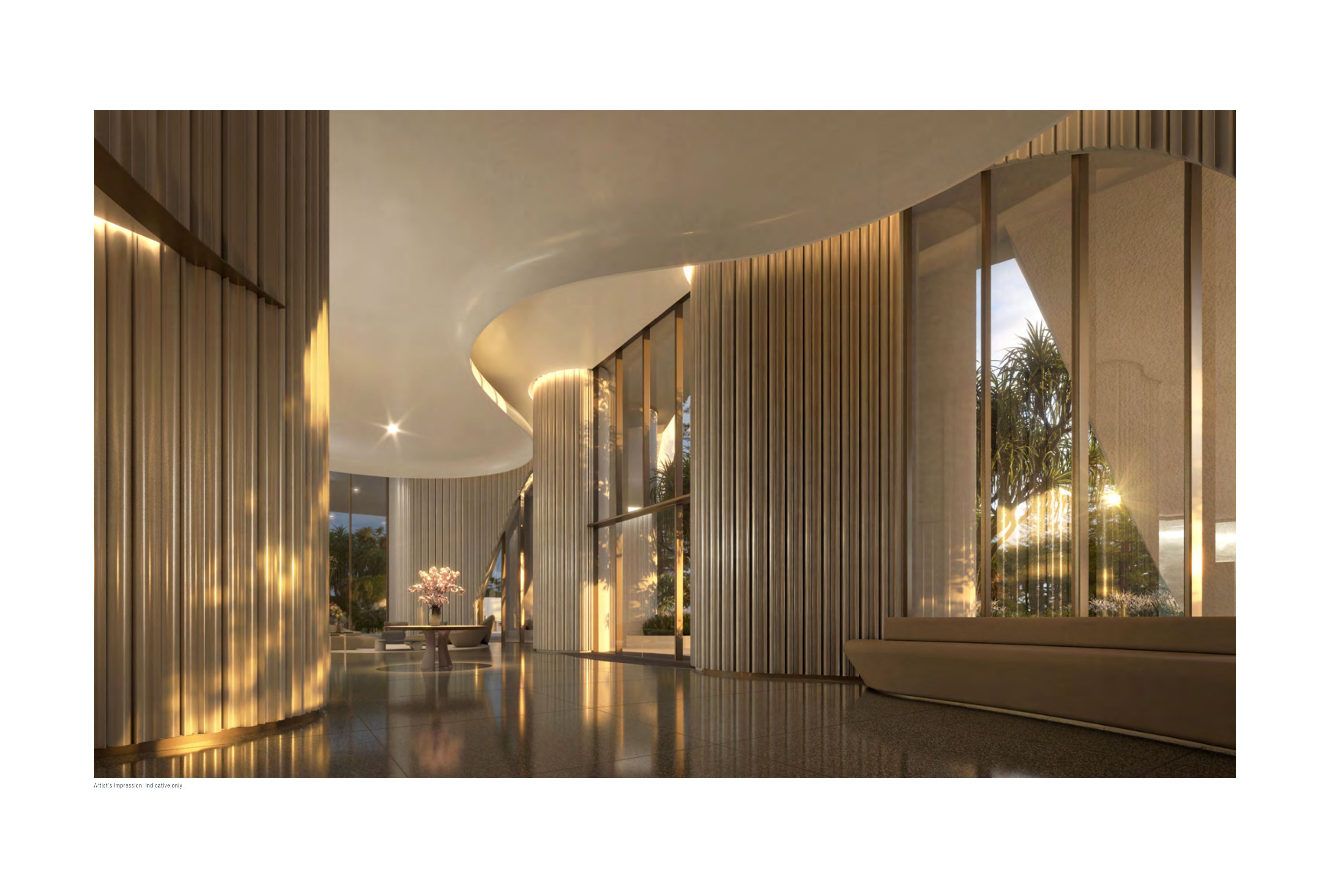 Soaring light-filled lobby featuring undulating natural green stone accents and dedicated concierge