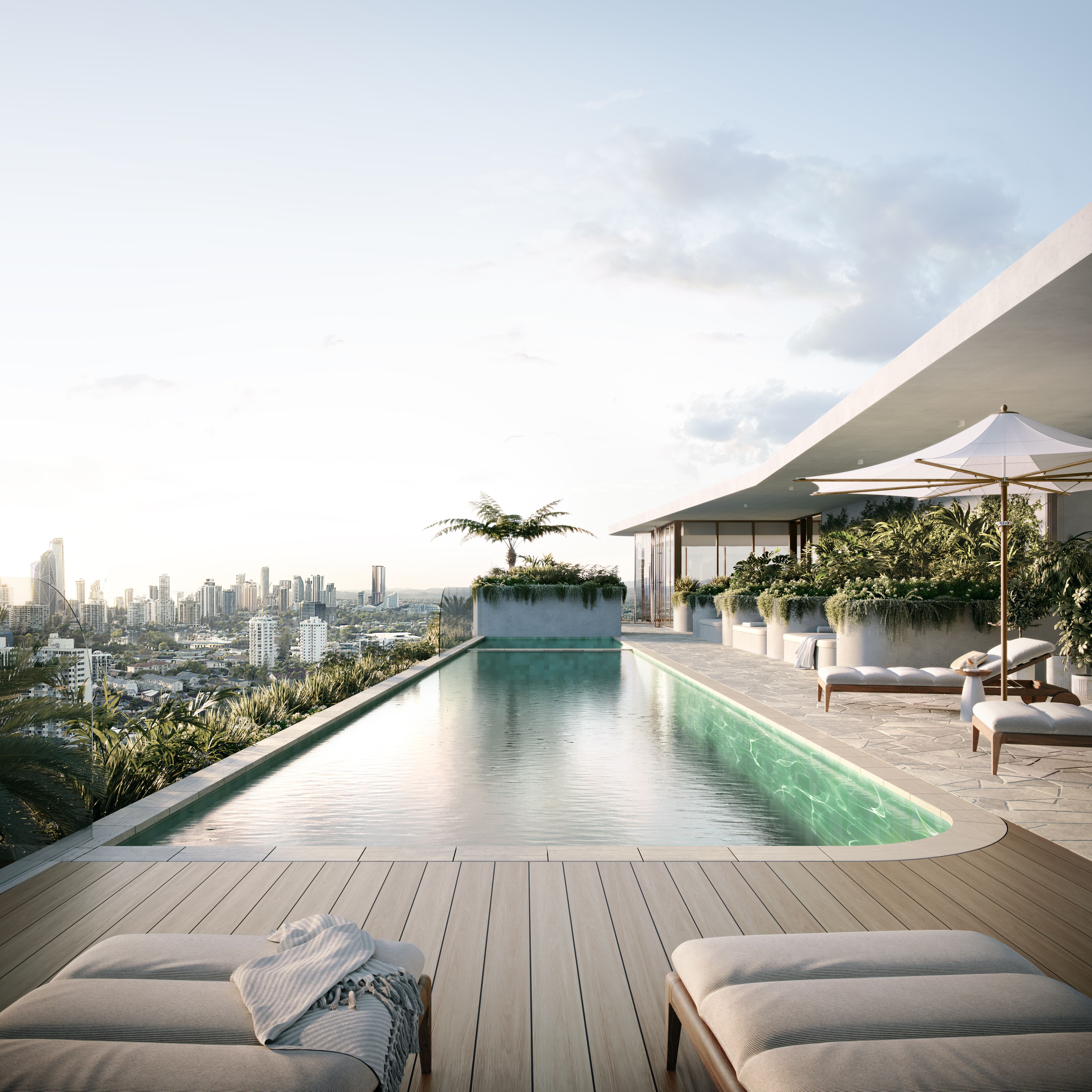 Orama rooftop heated lap pool and sundeck cabanas overlooking skyline