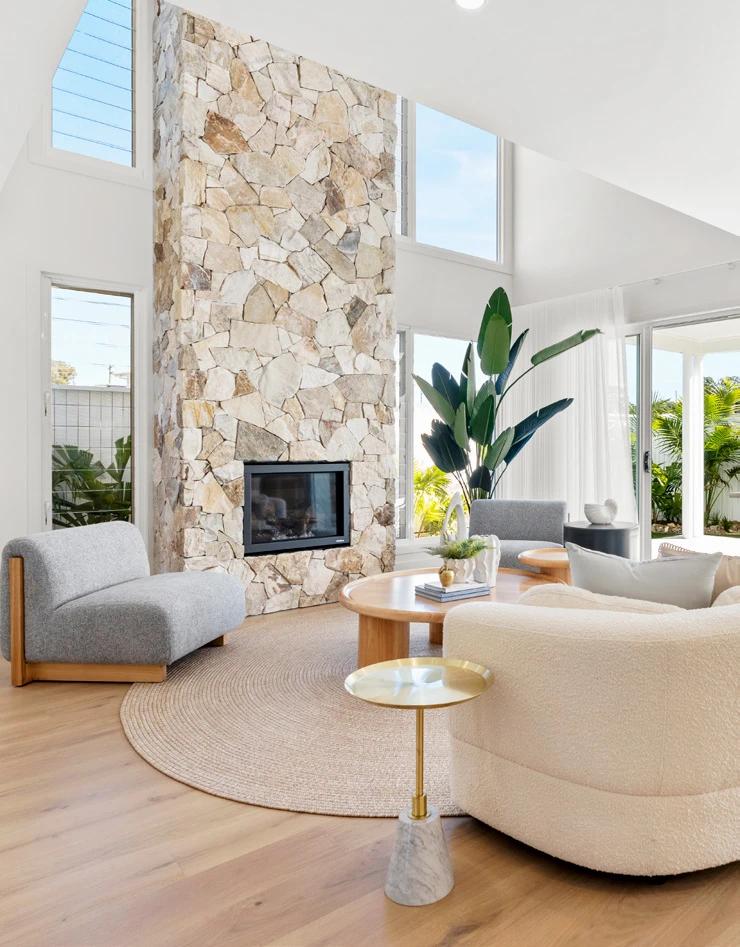 Abode Burpengary East Designer Living Room with Stone Fireplace