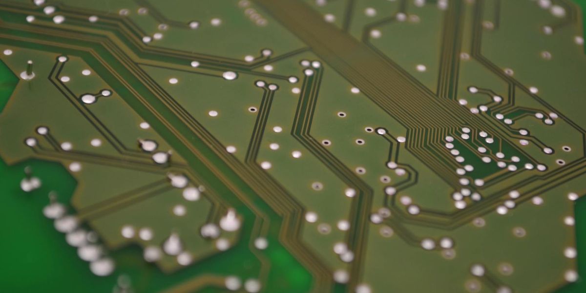 Close-up of a circuit board representing a long-running AI agent loop