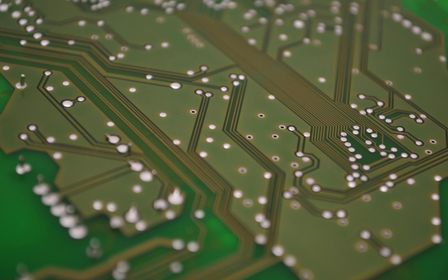 Close-up of a circuit board representing a long-running AI agent loop