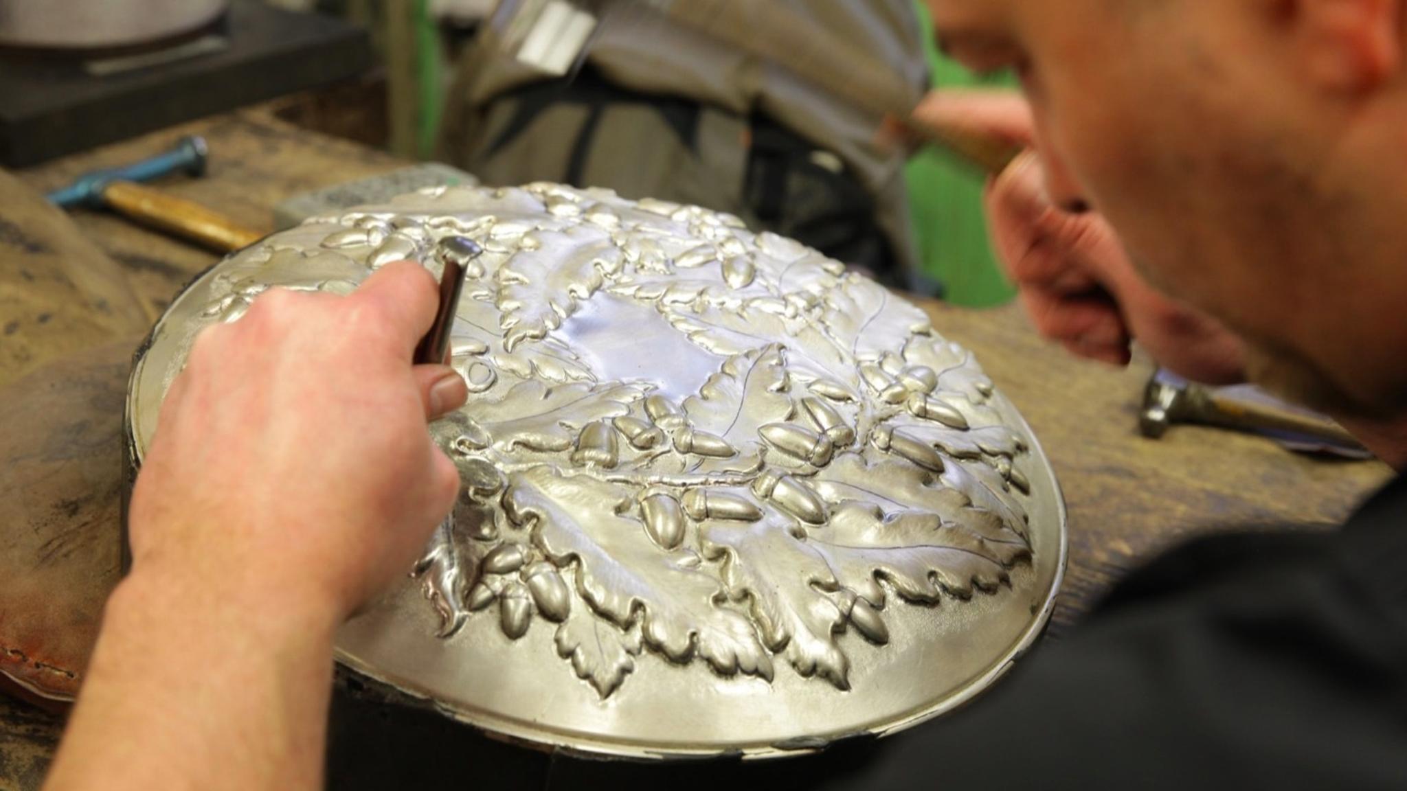 Engraving a silver bowl secured in pitch resin