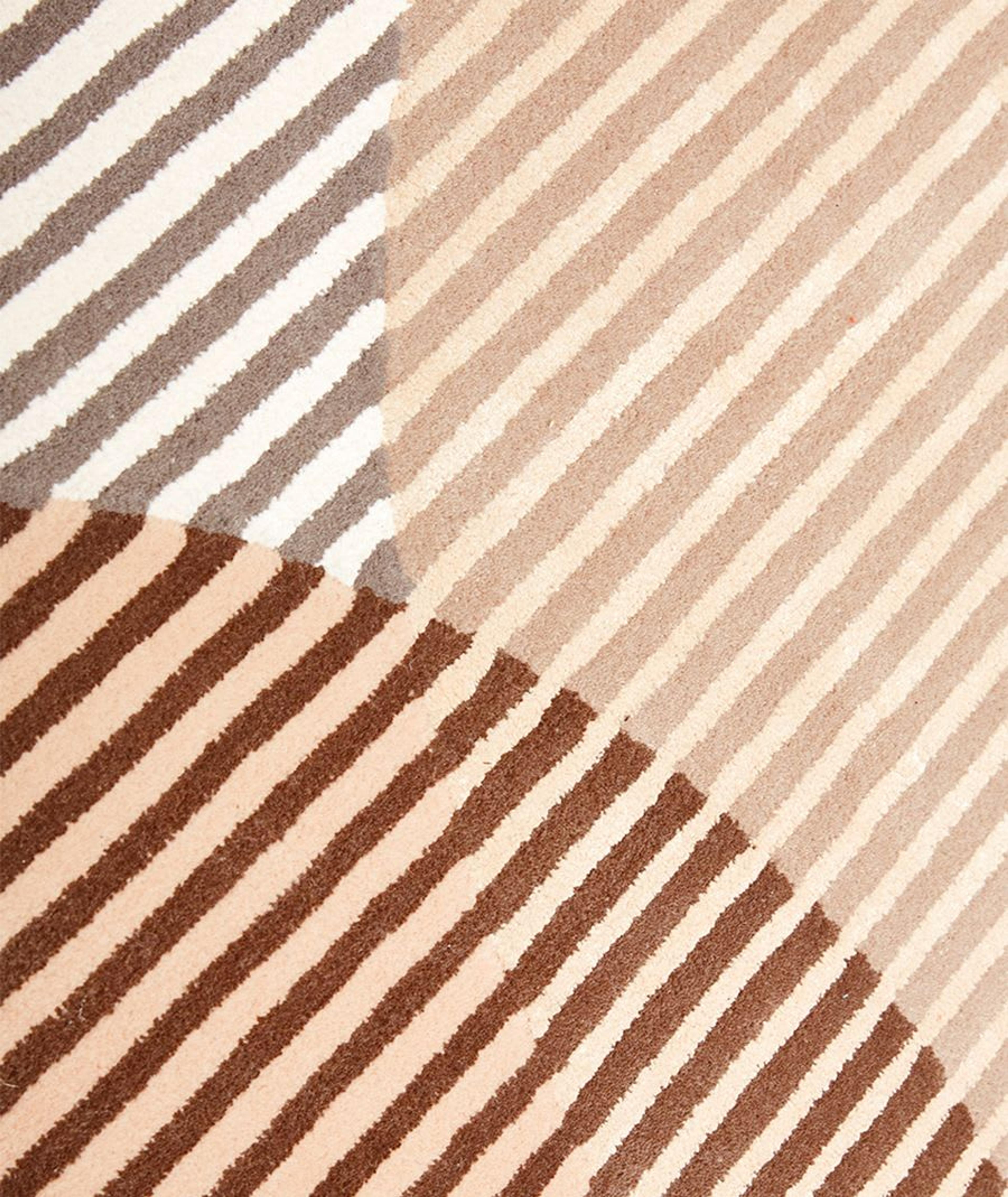A detail of the hand-tufted wool rug, designed by Polish designer Alicia Palys for Nodus