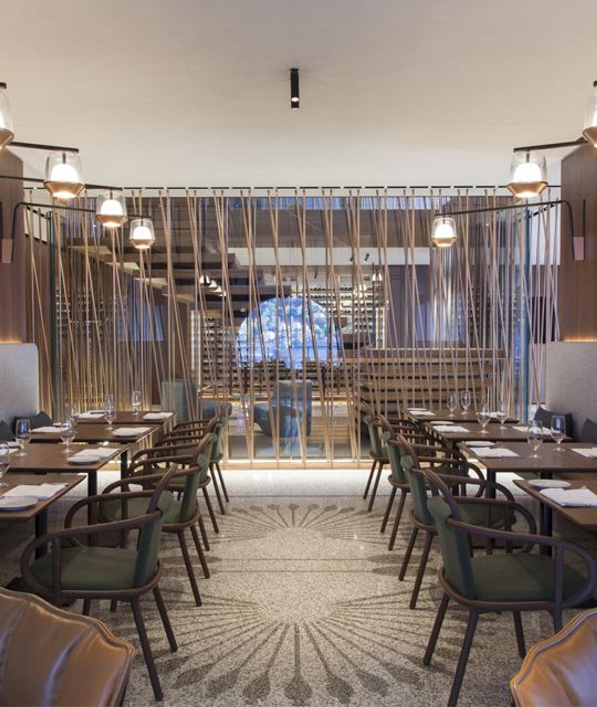 Le restaurant Berton Al Lago à l'intérieur de l'hôtel Il Sereno