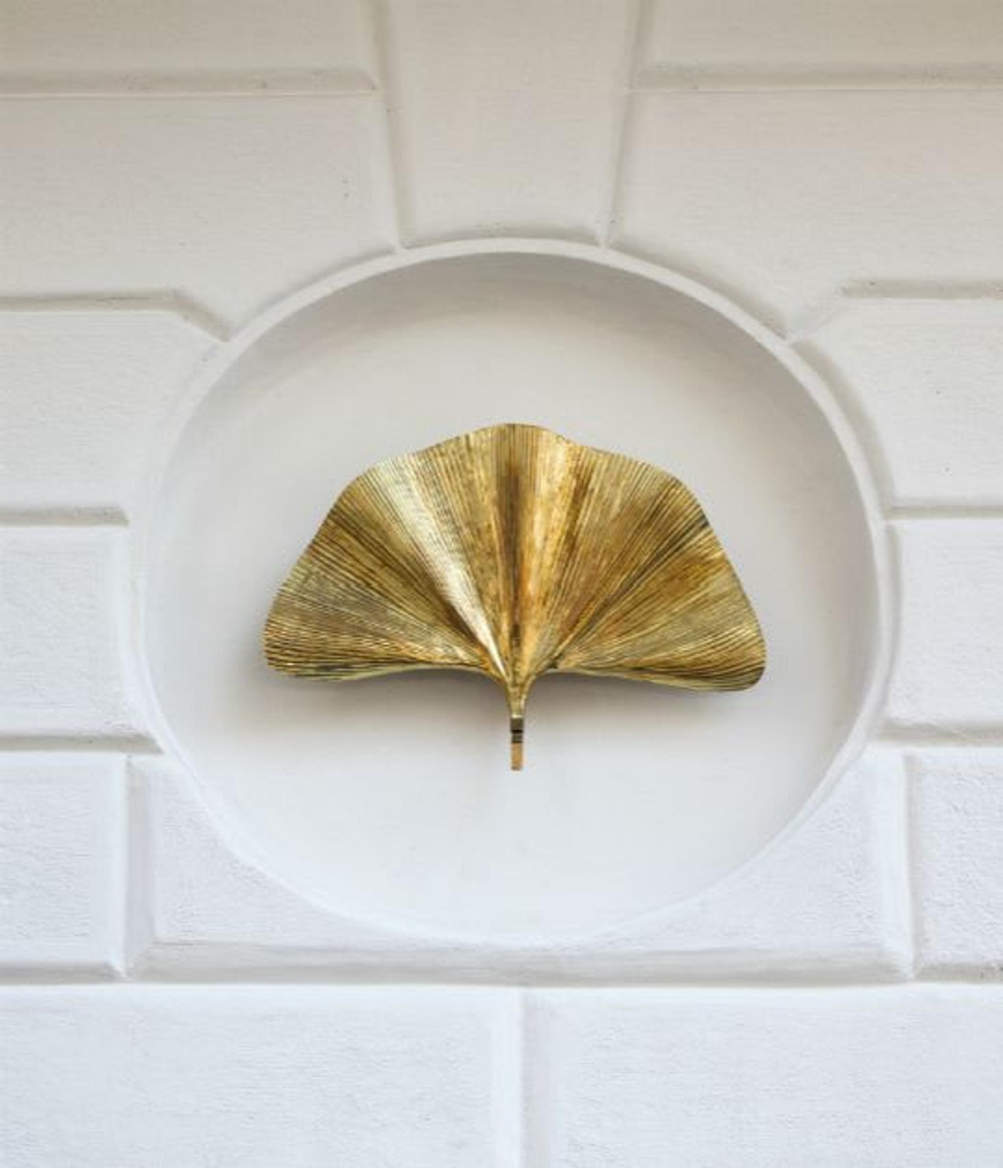 Ginkgo biloba brass leaf wall lamp by local artisan Bottega Gadda.