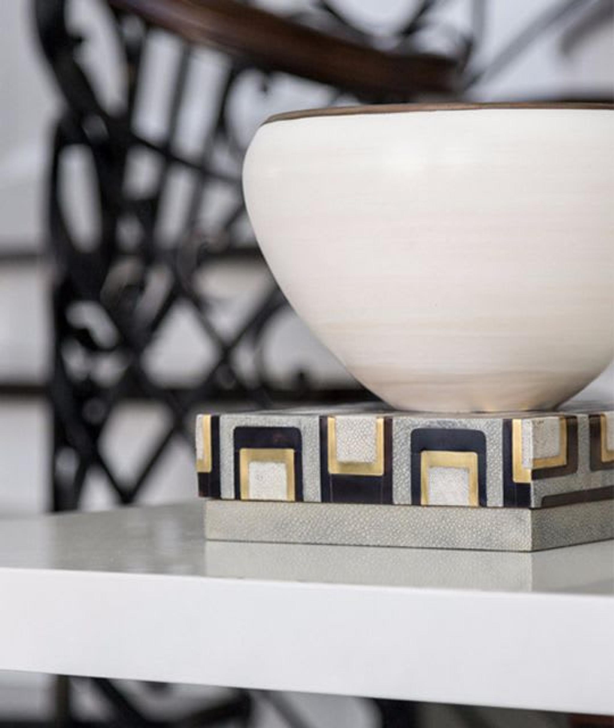 Details of home décor pieces that style the hall table