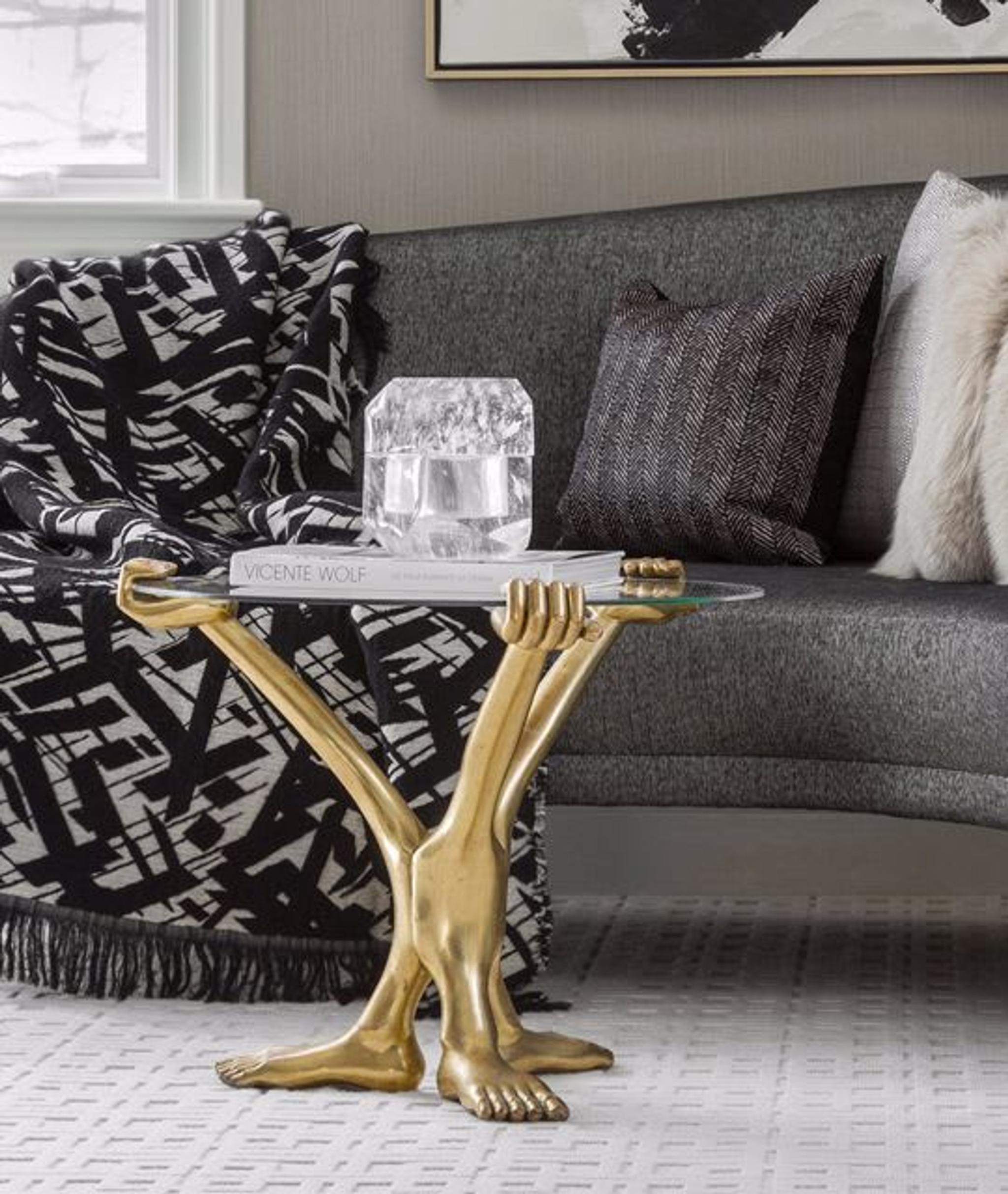 Decorative coffee table in glass and brass