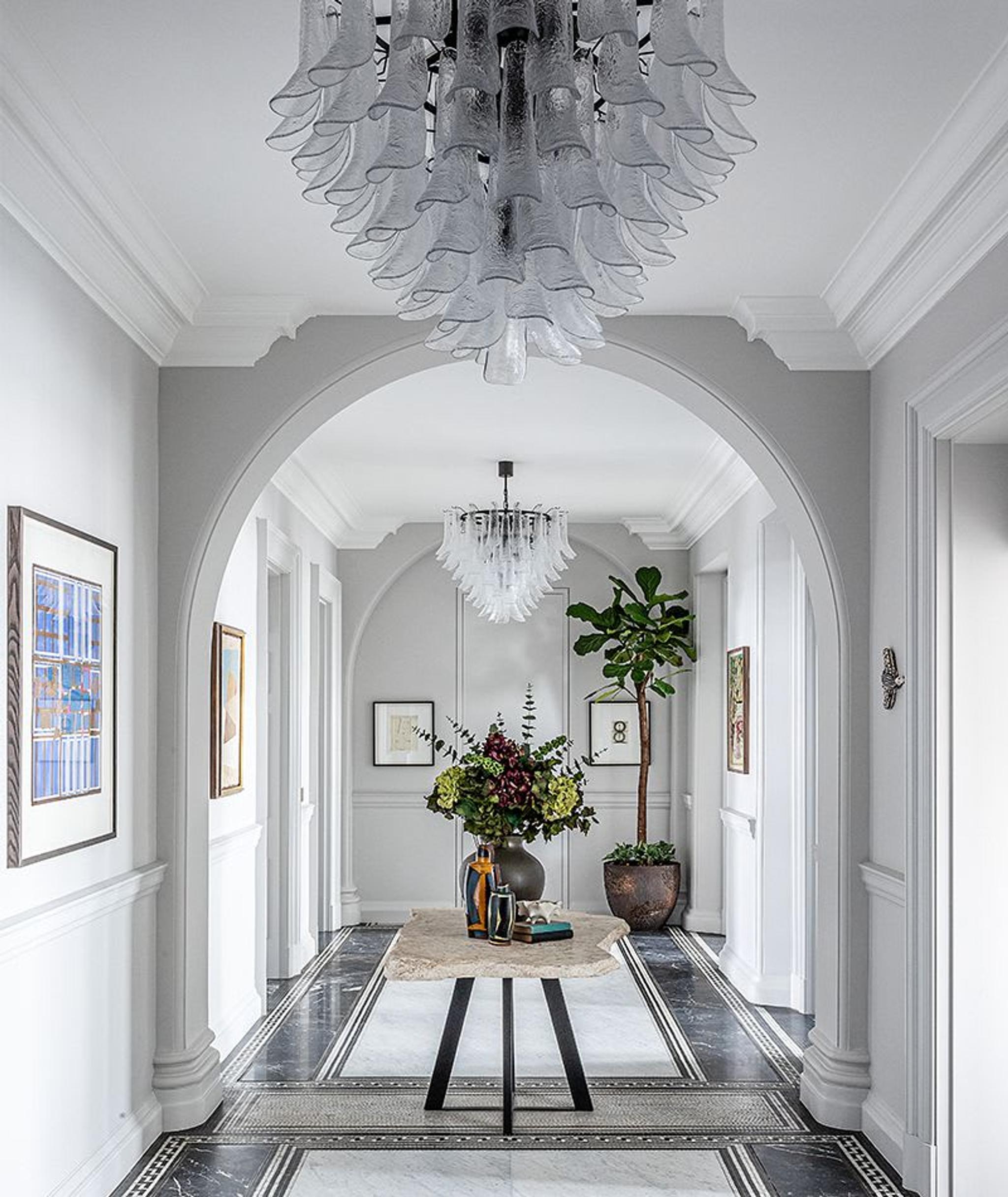 The OWO Residences, Entrance Hall: two lavish, handcrafted Murano-glass pendants set the tone for this grand entrance hall