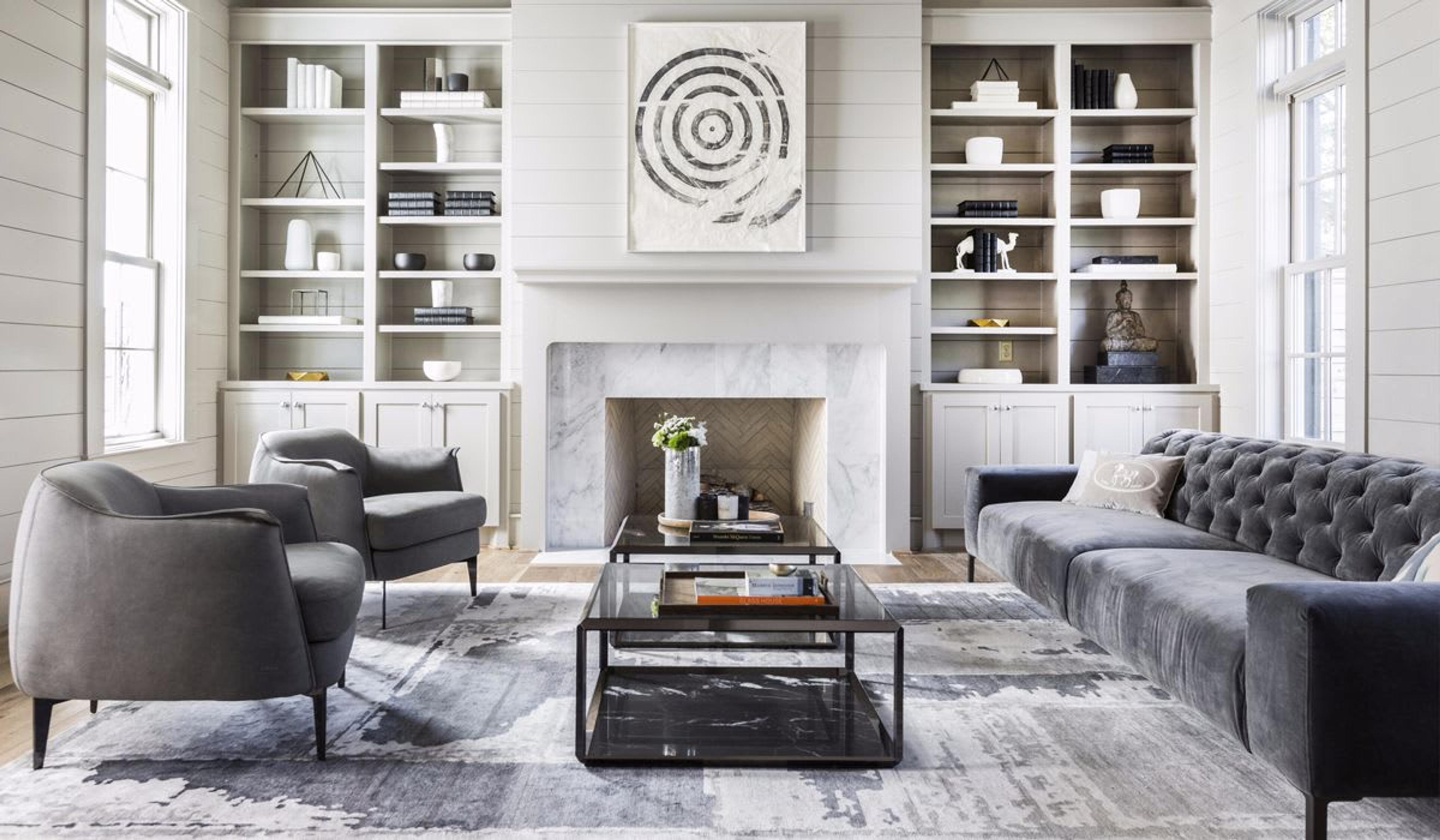 This living room was created for renowned chef Sandra Lee. Due to the beautiful millwork and architectural elements in the house, Nina opted to infuse neutral and muted colors to the space to bring out details in the home while still creating a sense of comfort. 