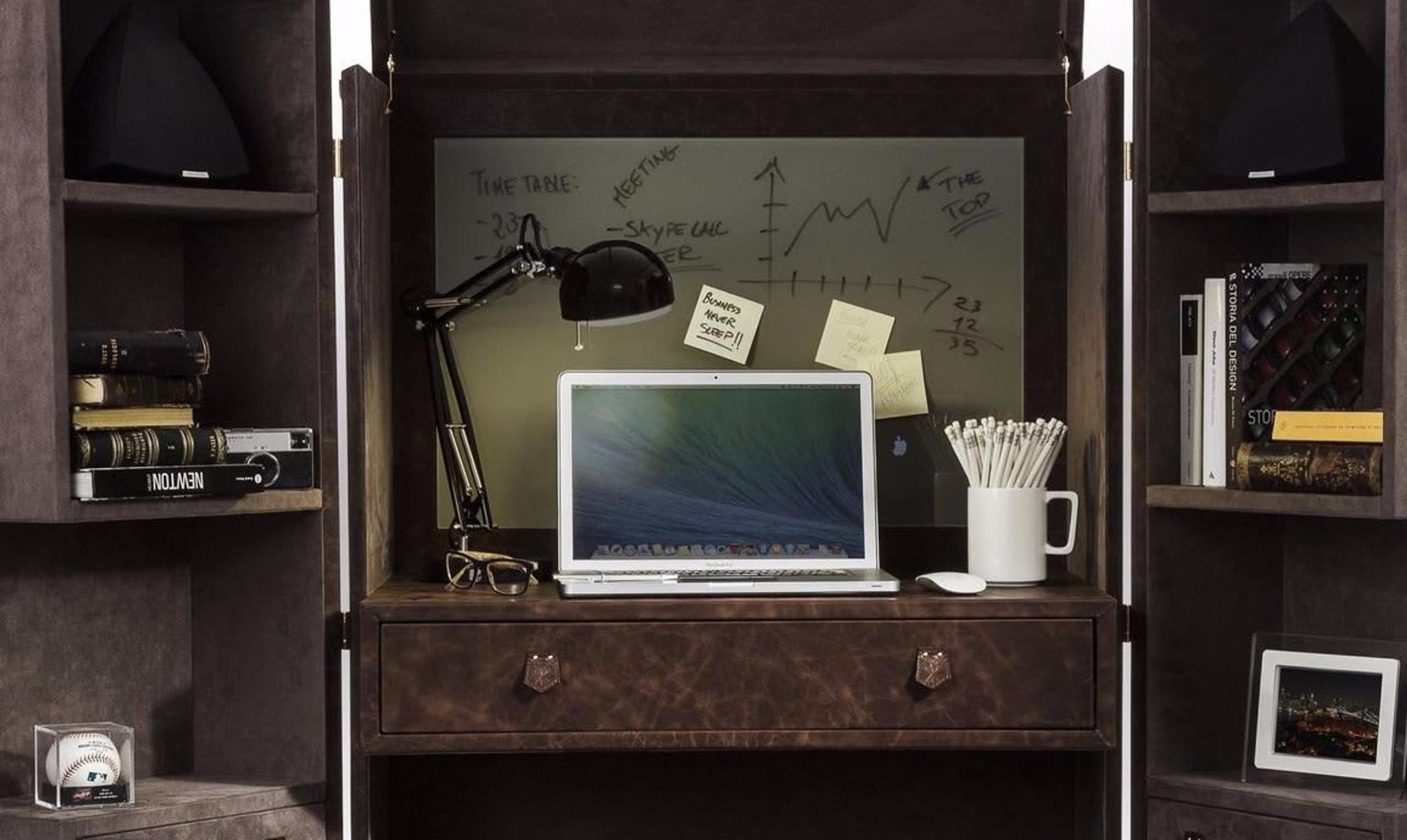 Interiors of the refined Milano Trunk crafted by expert artisans using top-grain calf leather, poplar wood, textiles and brass