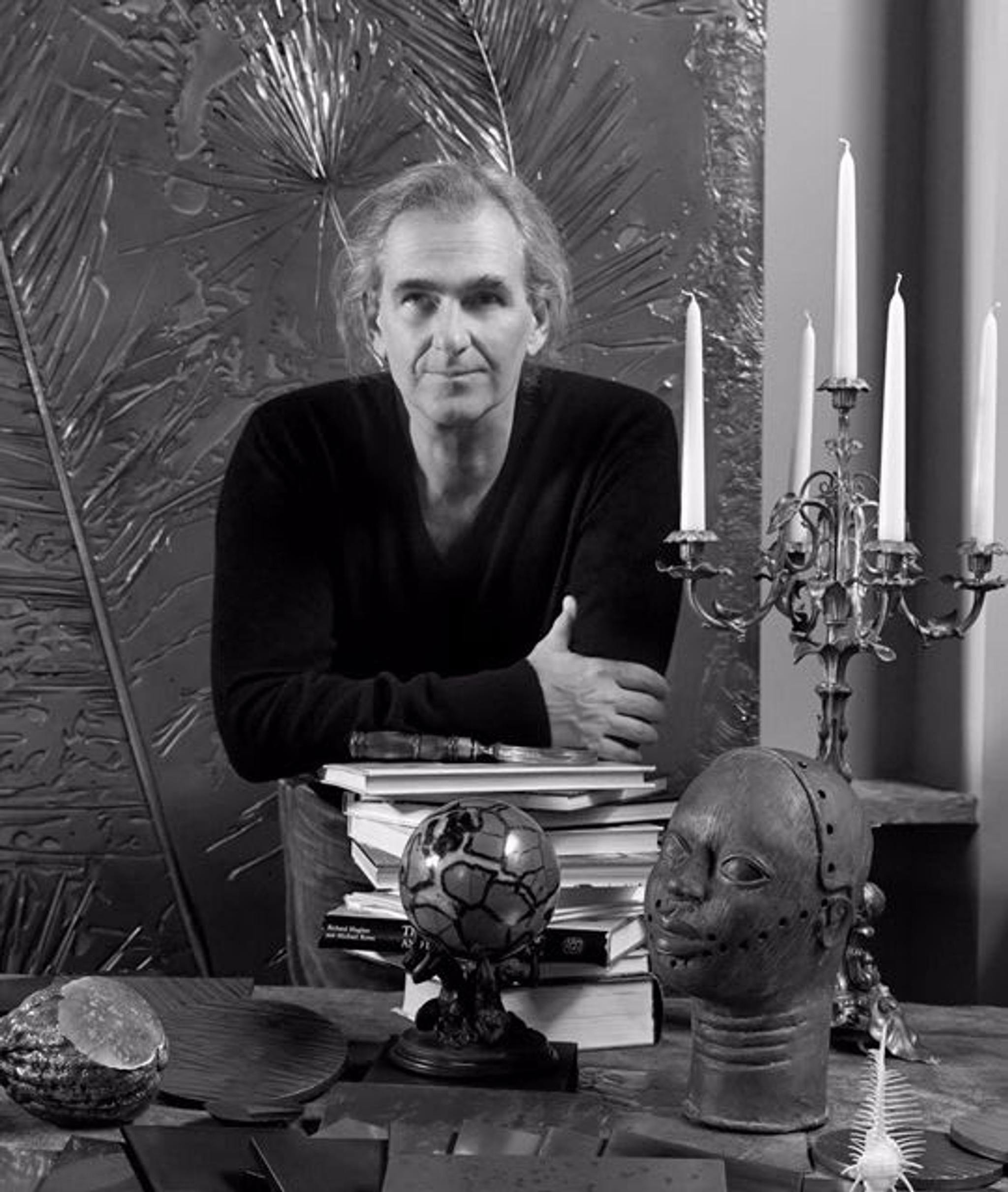 Gianluca Pacchioni, master in the art of forging metals, in his Milan-based studio and workshop