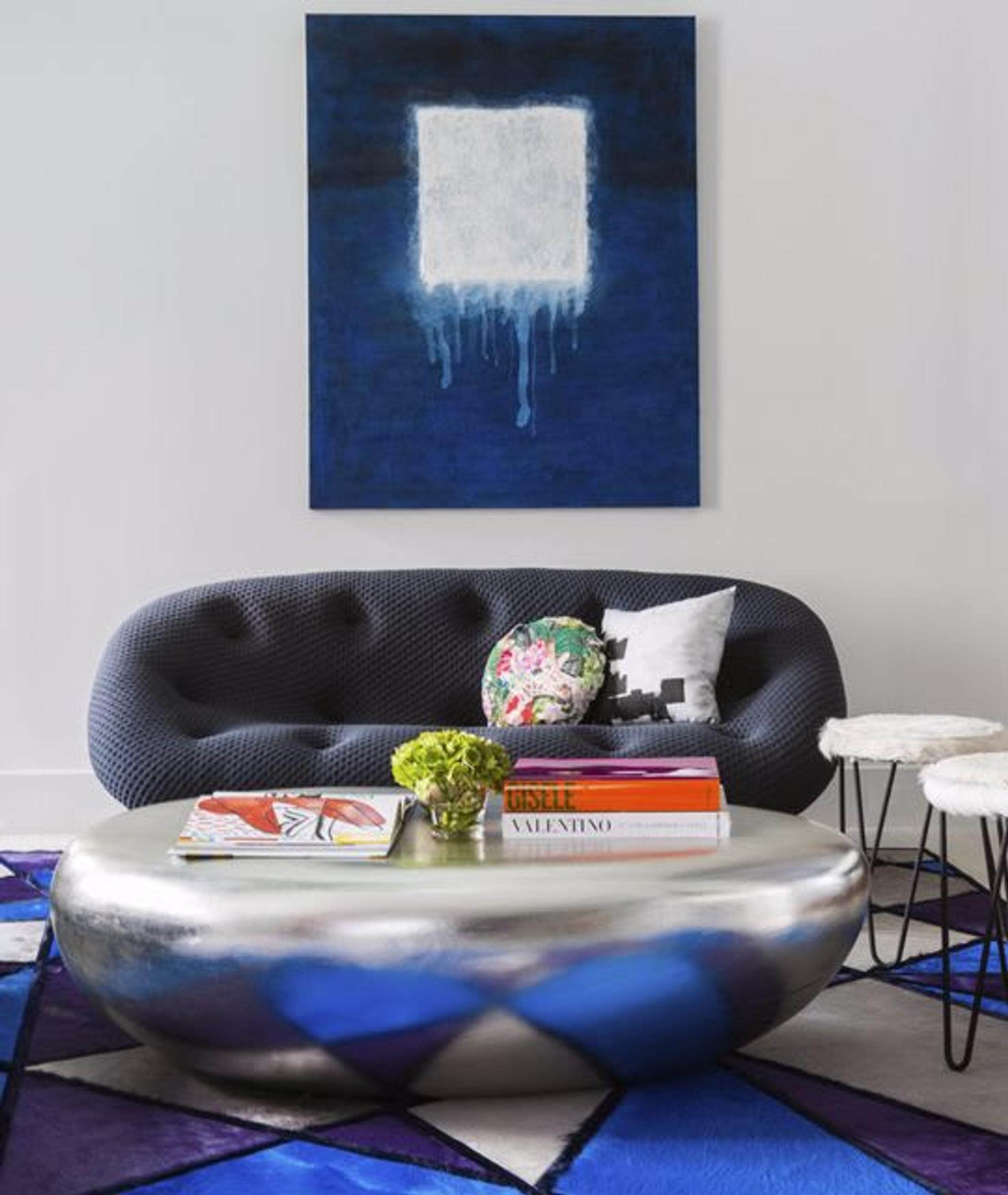Unique statement pieces from Ligne Roset, Roche Bobois, and Polyform are incorporated around the interior exuding a mod-Italian- European style. 
