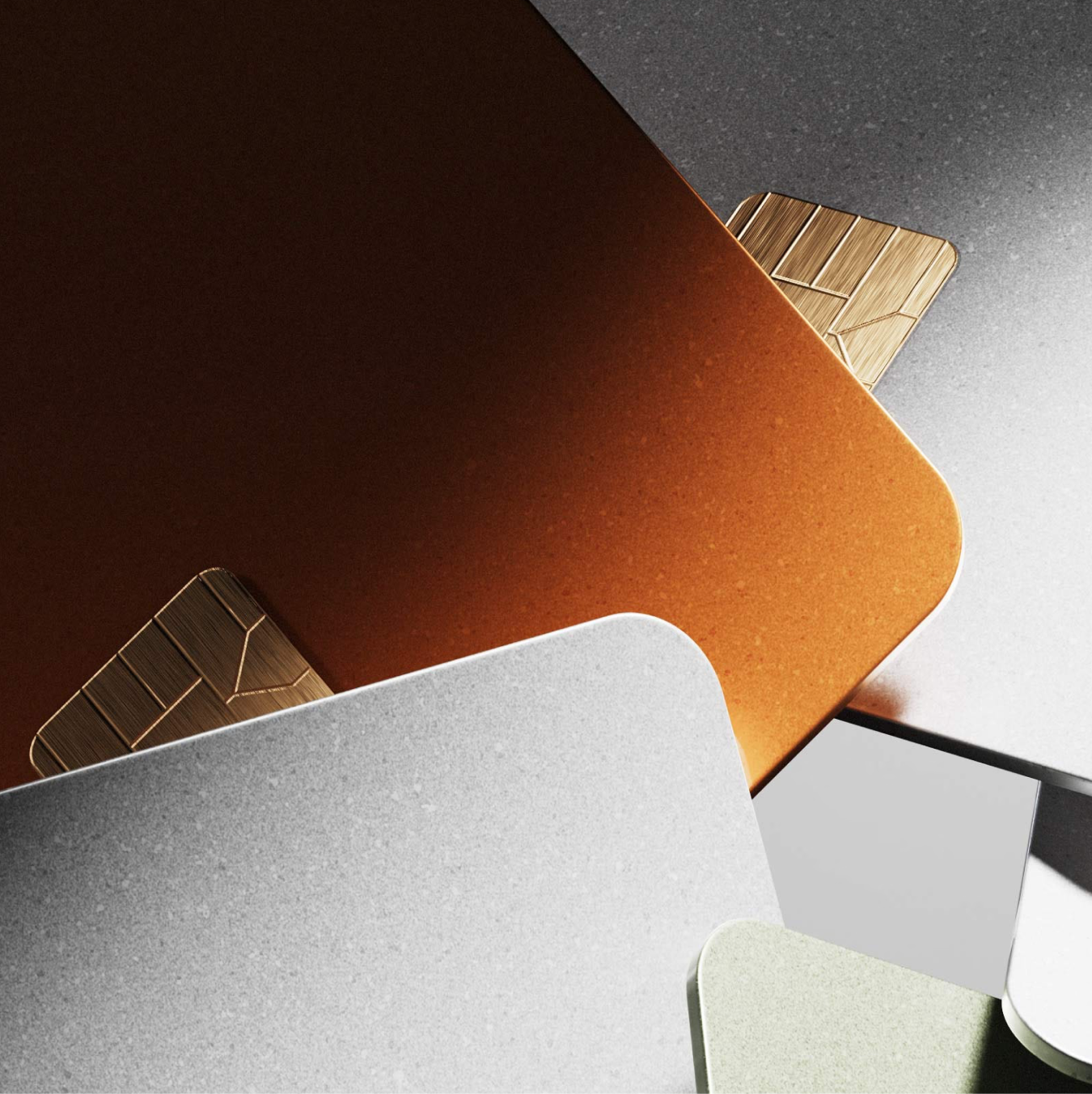 Overlapping credit cards in bronze, grey, and light green, with golden chips visible.