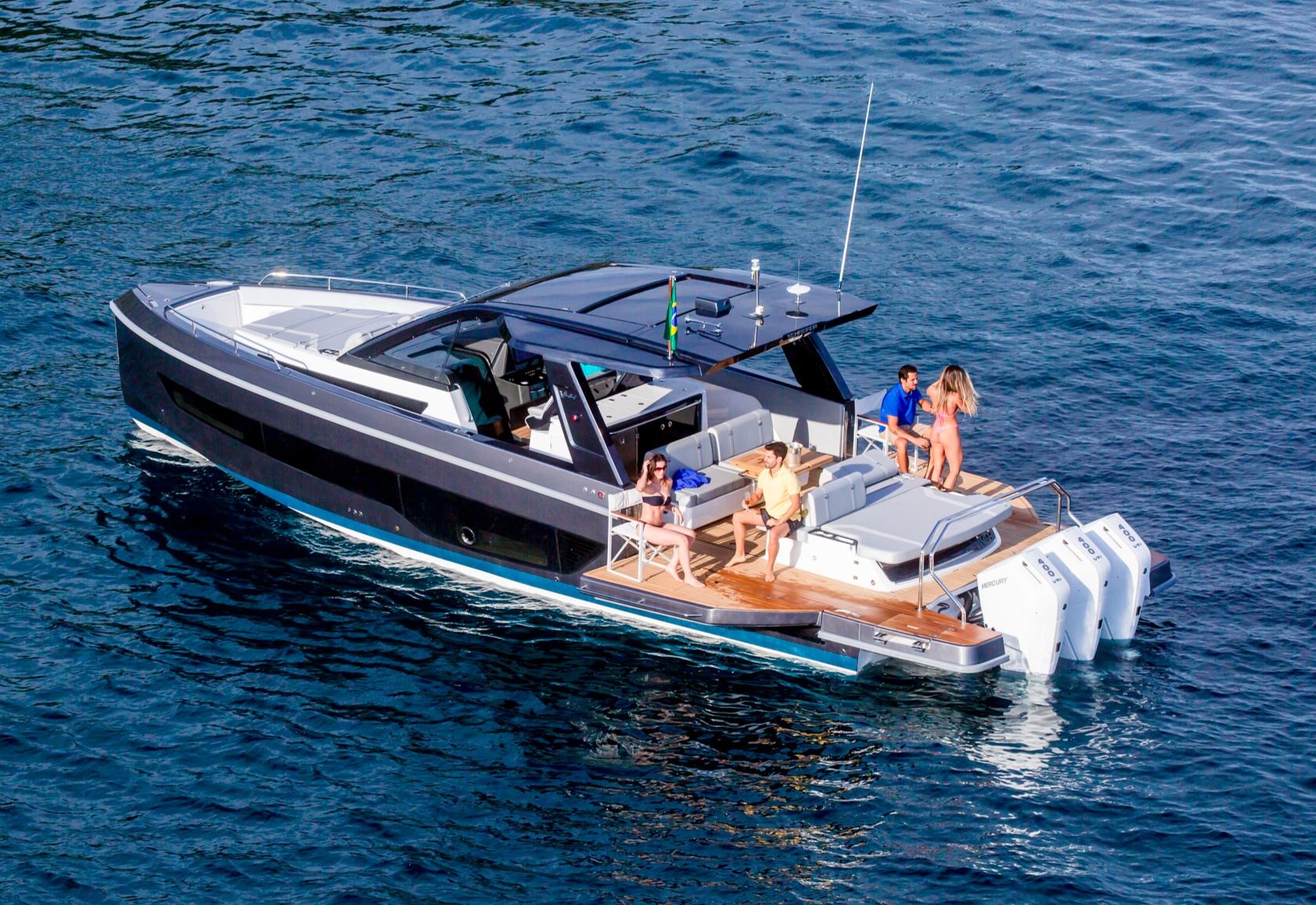 Schaefer V44 day boat with guests relaxing aboard