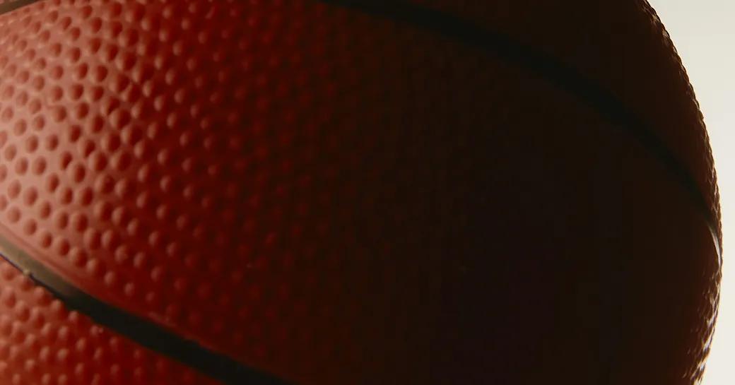 Why do the Knicks wear orange and blue?