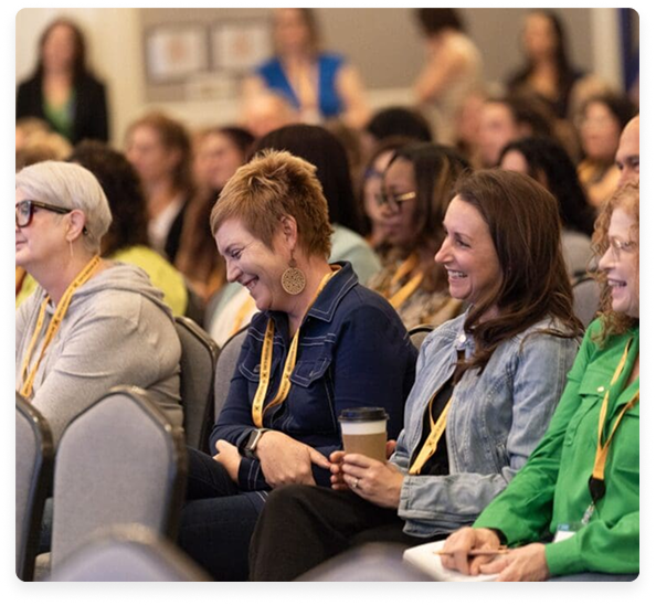 A full conference audience seated for a session.