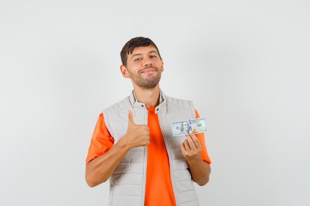 Professional holding cash, symbolizing innovative e-commerce strategies beyond tariffs.