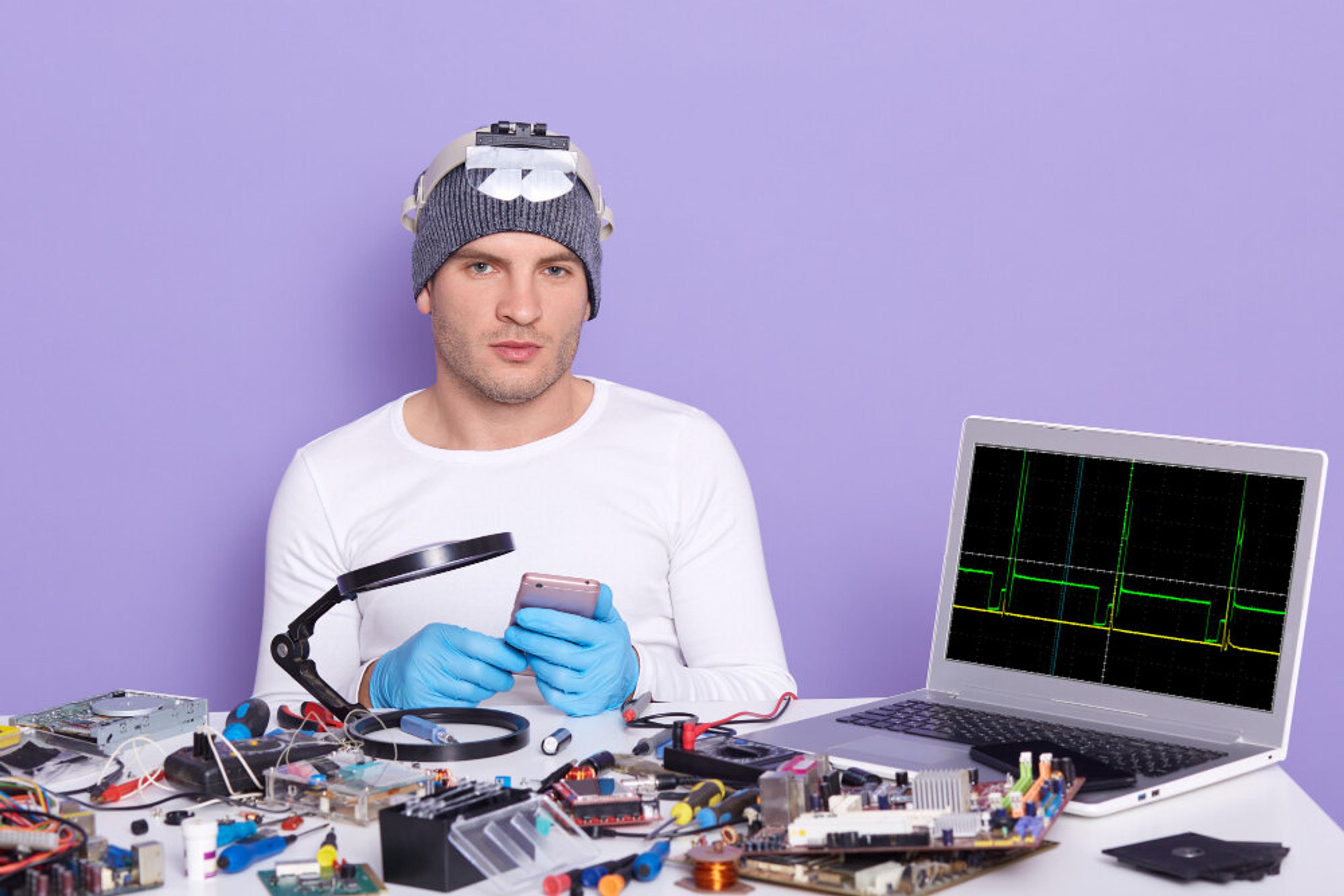 Technician exploring e-waste solutions and warranty implications for 2025 sustainability goals.