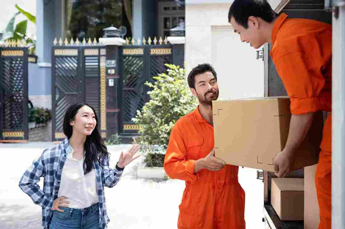 Delivery scene highlighting the importance of free returns for online shoppers.