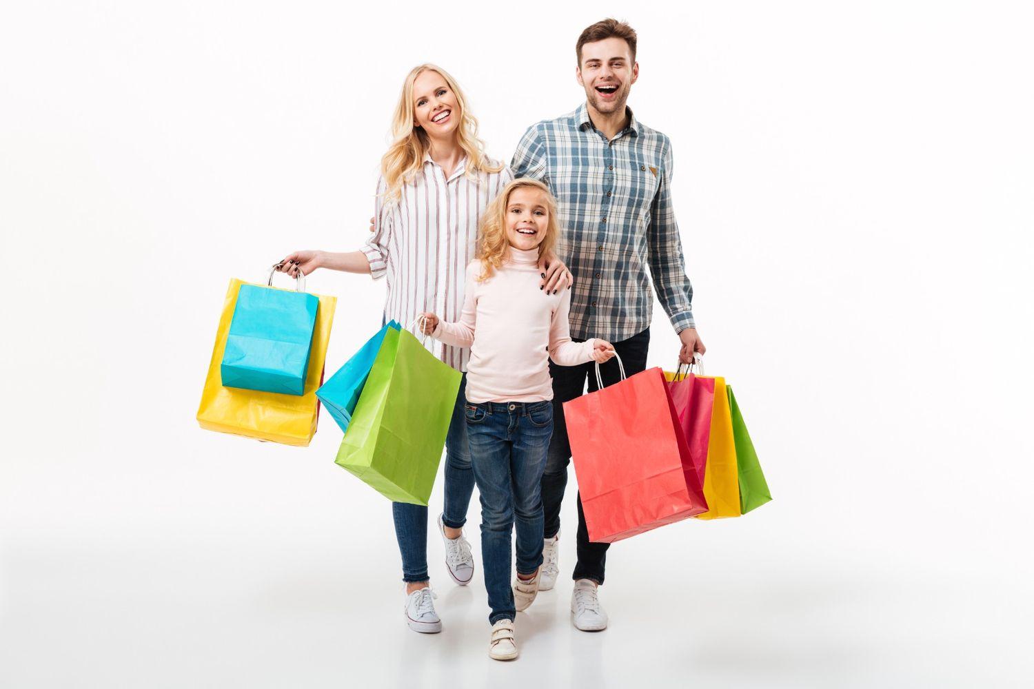 Families shopping with colorful bags, boosting sales for merchants in July.