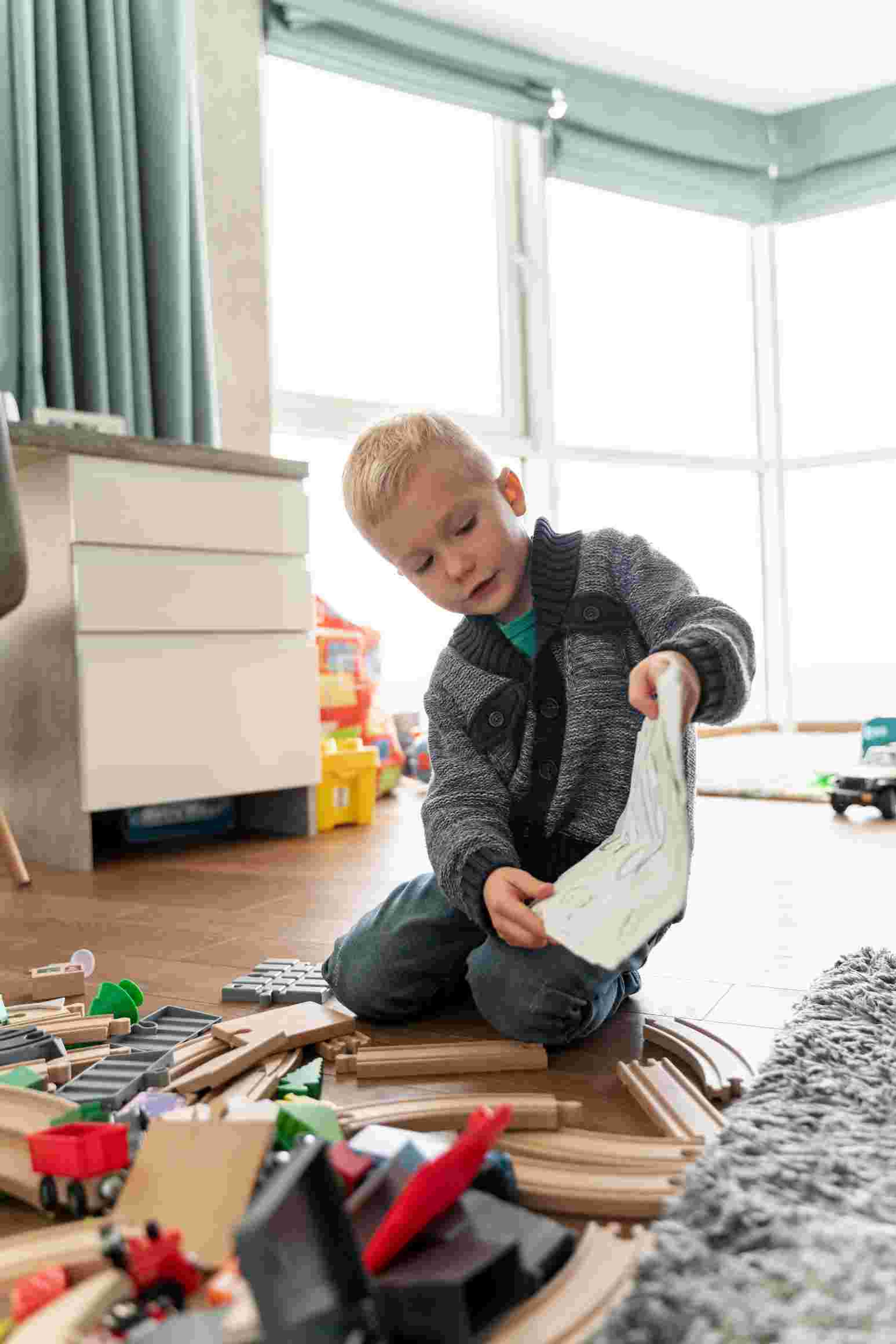 kid playing on the floor