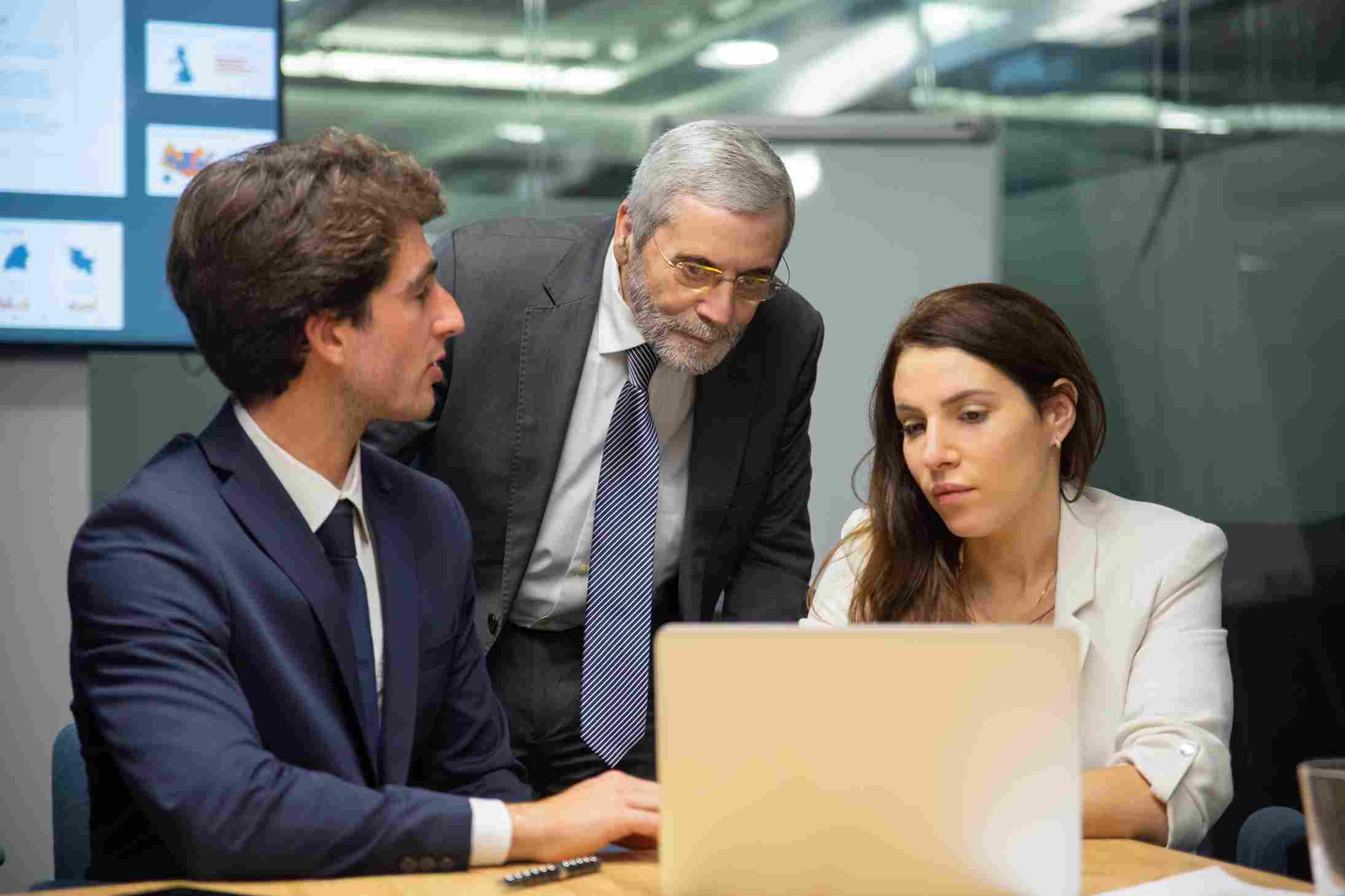 Business team discussions on AI efficiency and meaningful decision-making strategies.