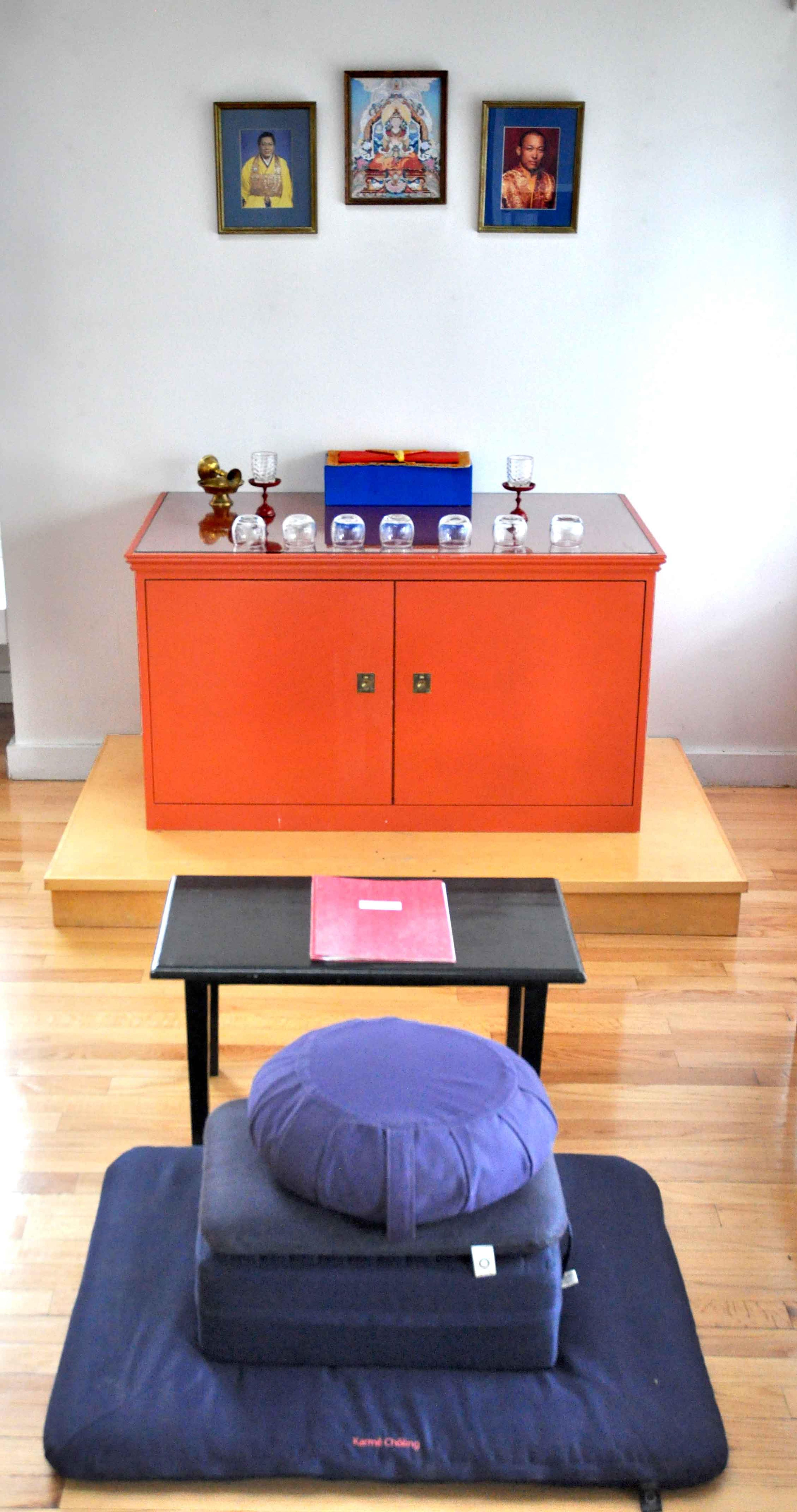 Simple shrine set-up in Solitary Retreat Cabins at Karme Choling Meditation Retreat Center, Vermont