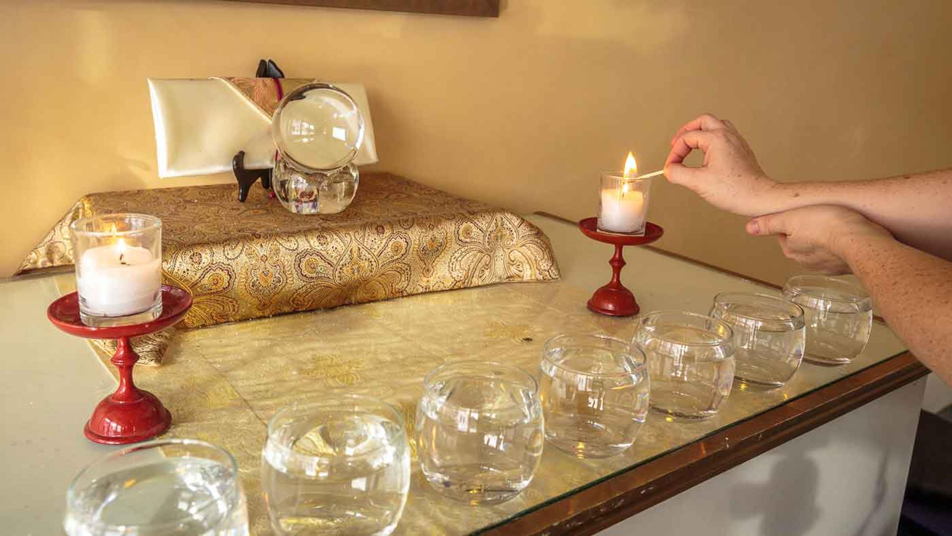 Shrine being lighted at Karmê Chöling meditation retreat center