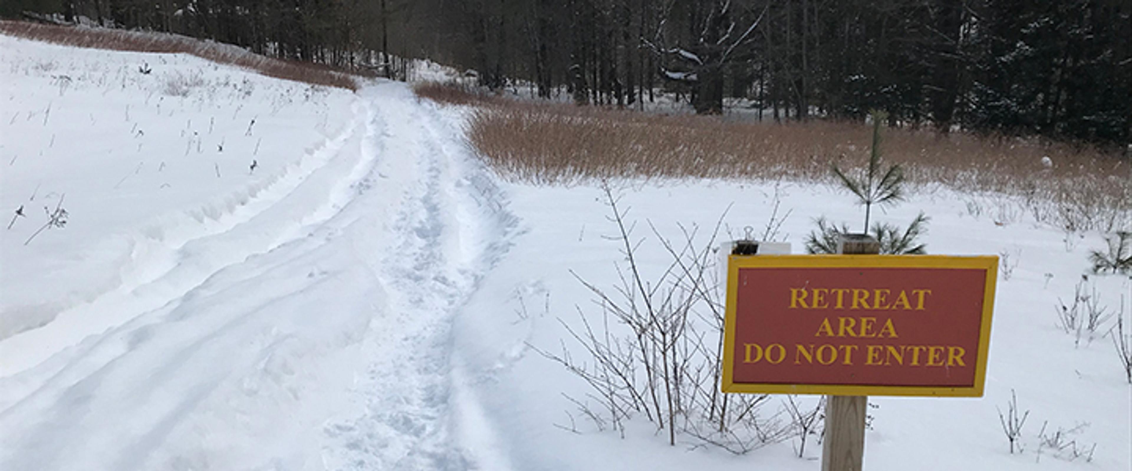 Solitary retreat cabin sign at Karme Choling meditation retreat center, Vermont