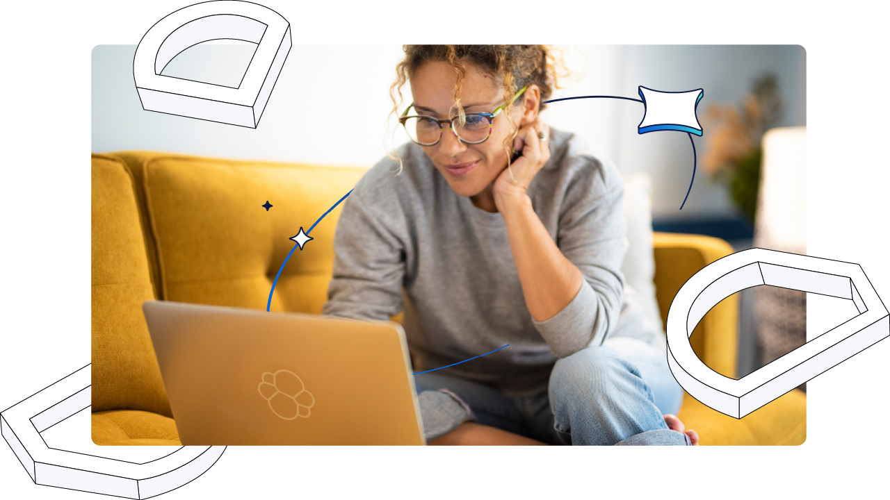 Woman on couch at laptop