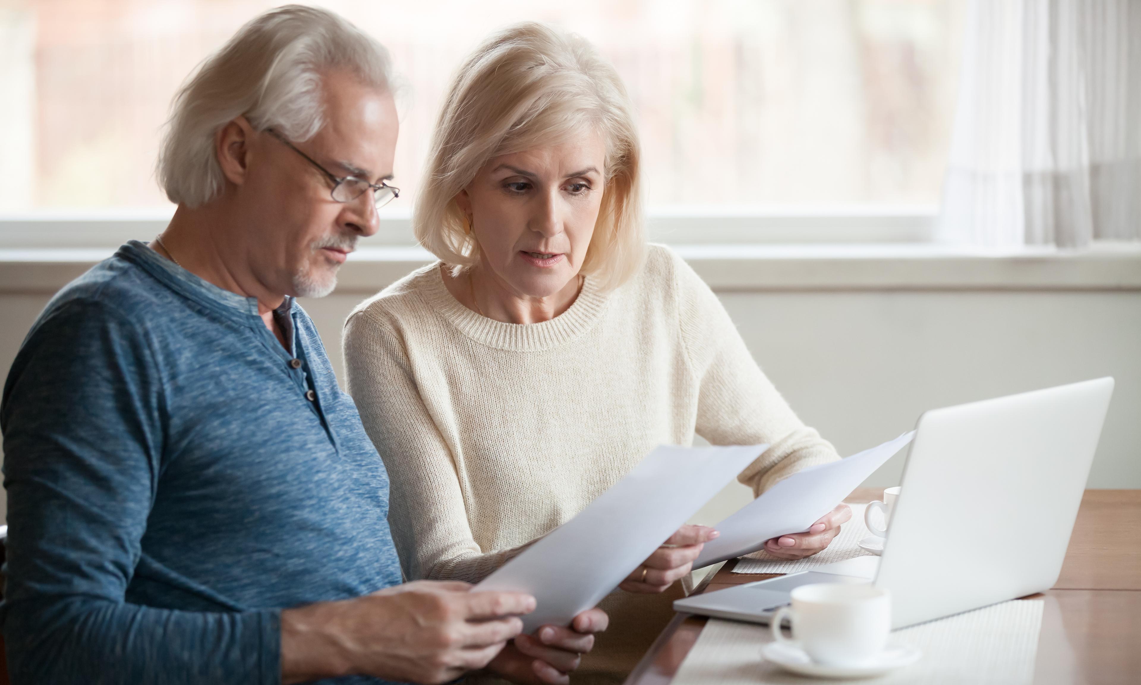 people reading insurance declaration page people reading insurance declaration page