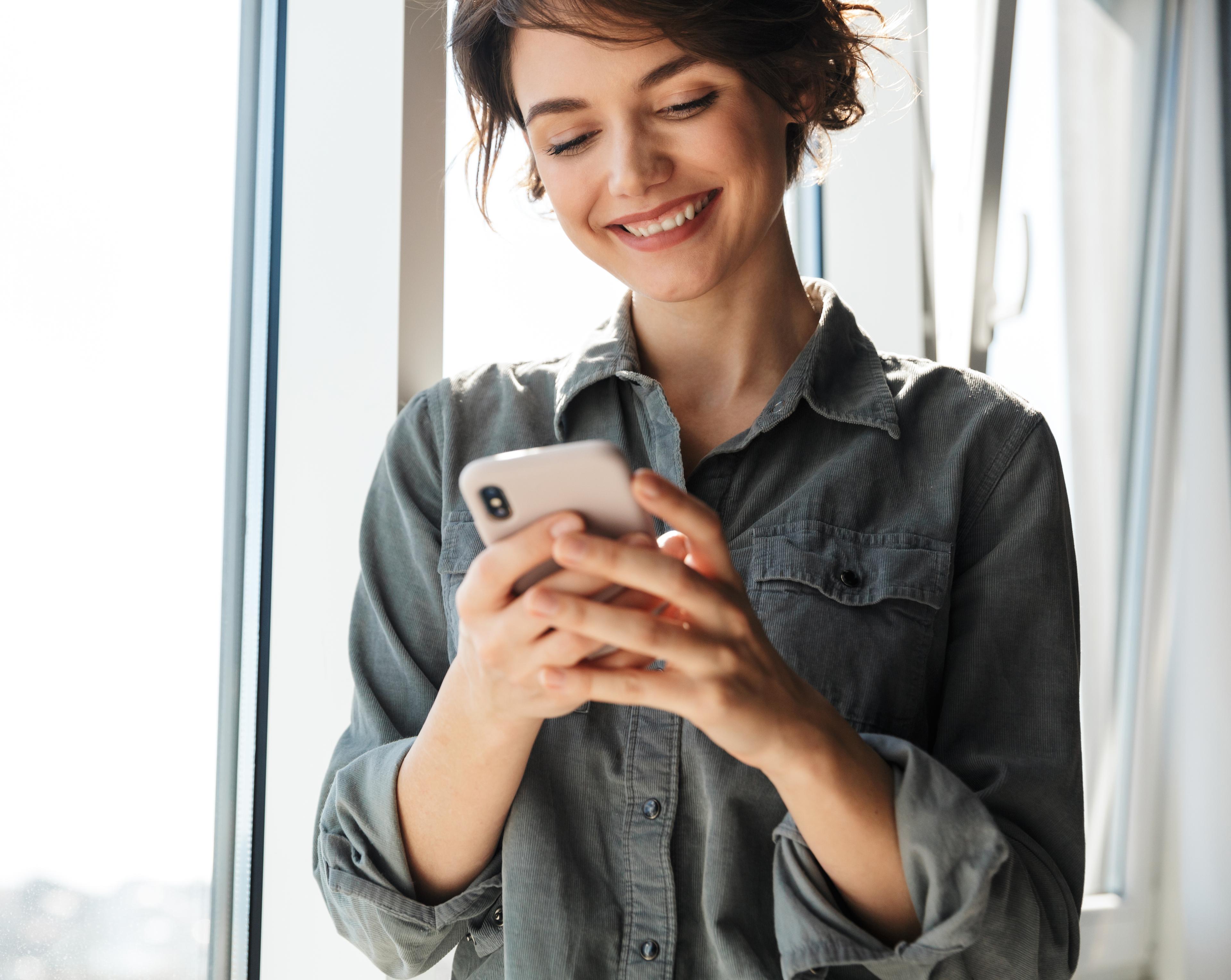Girl on phone buying insurance