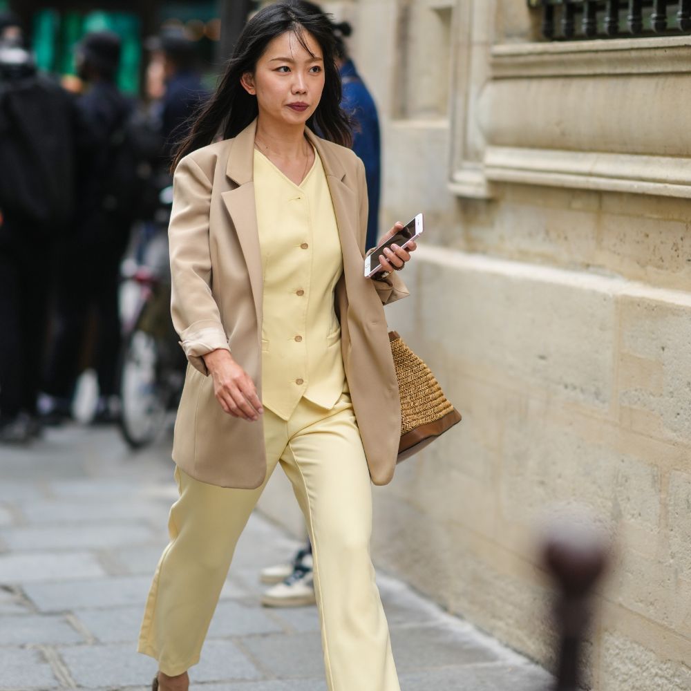 Woman wearing pastel clothing 