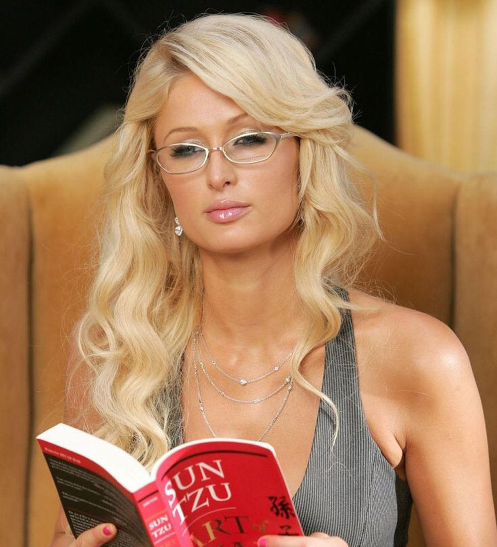 Paris Hilton reading a book. 