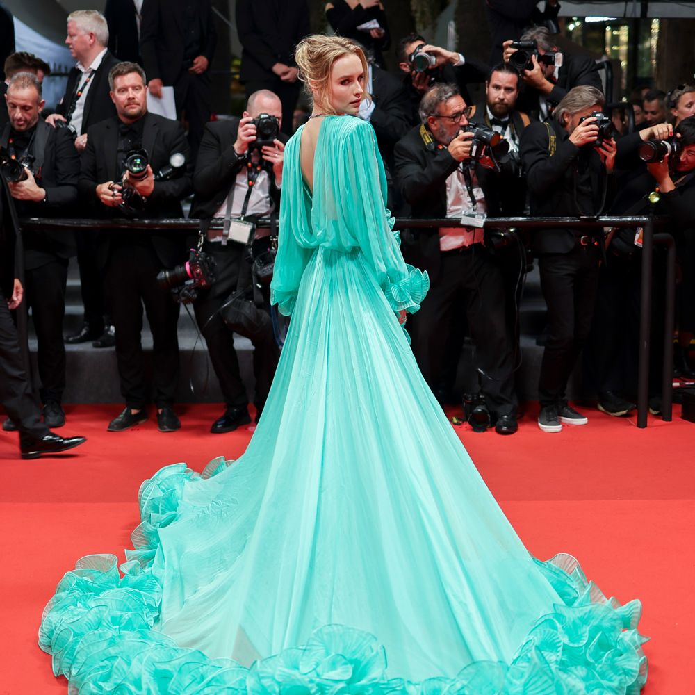 Olivia DeJonge in a green Gucci gown at the Cannes Film Festival. 